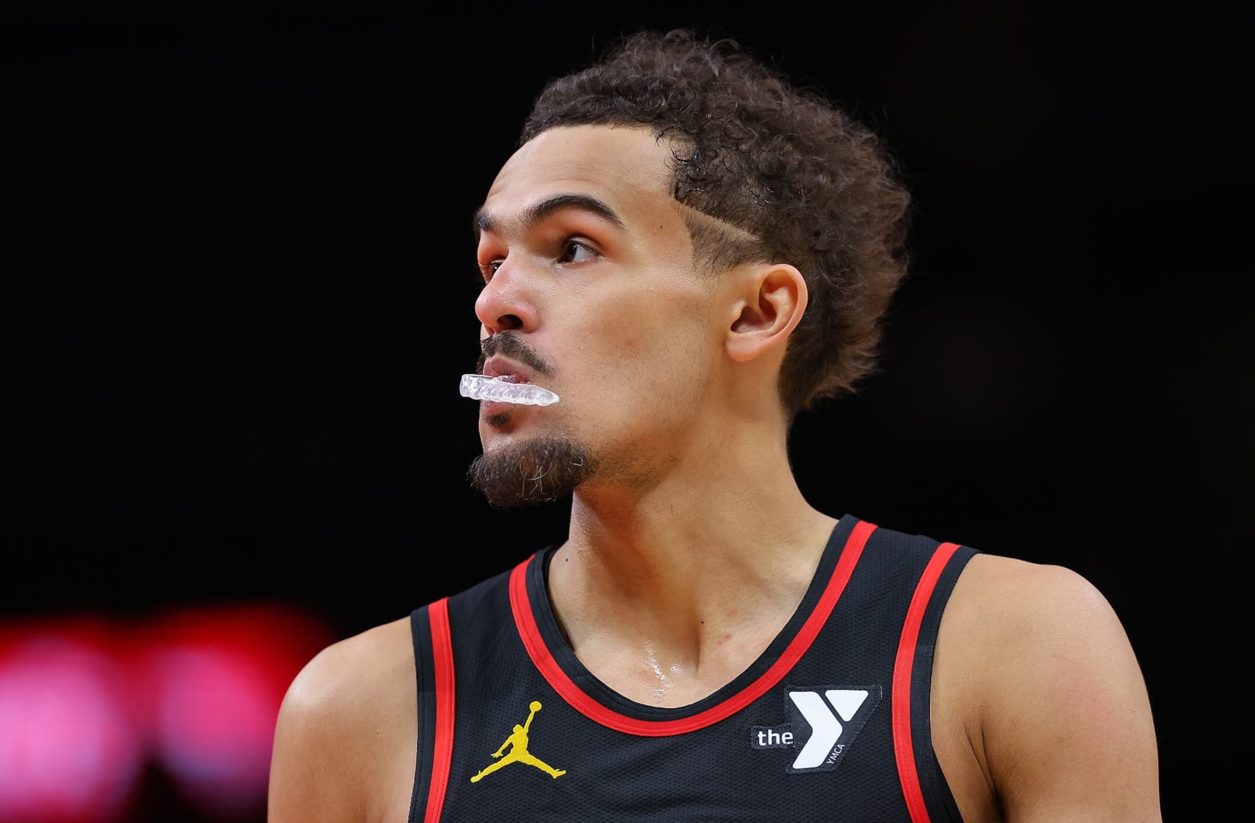 ATLANTA, GEORGIA - FEBRUARY 05:  Trae Young #11 of the Atlanta Hawks reacts in the final seconds of their 149-144 loss to the LA Clippers at State Farm Arena on February 05, 2024 in Atlanta, Georgia.  NOTE TO USER: User expressly acknowledges and agrees that, by downloading and/or using this photograph, user is consenting to the terms and conditions of the Getty Images License Agreement.  (Photo by Kevin C. Cox/Getty Images)