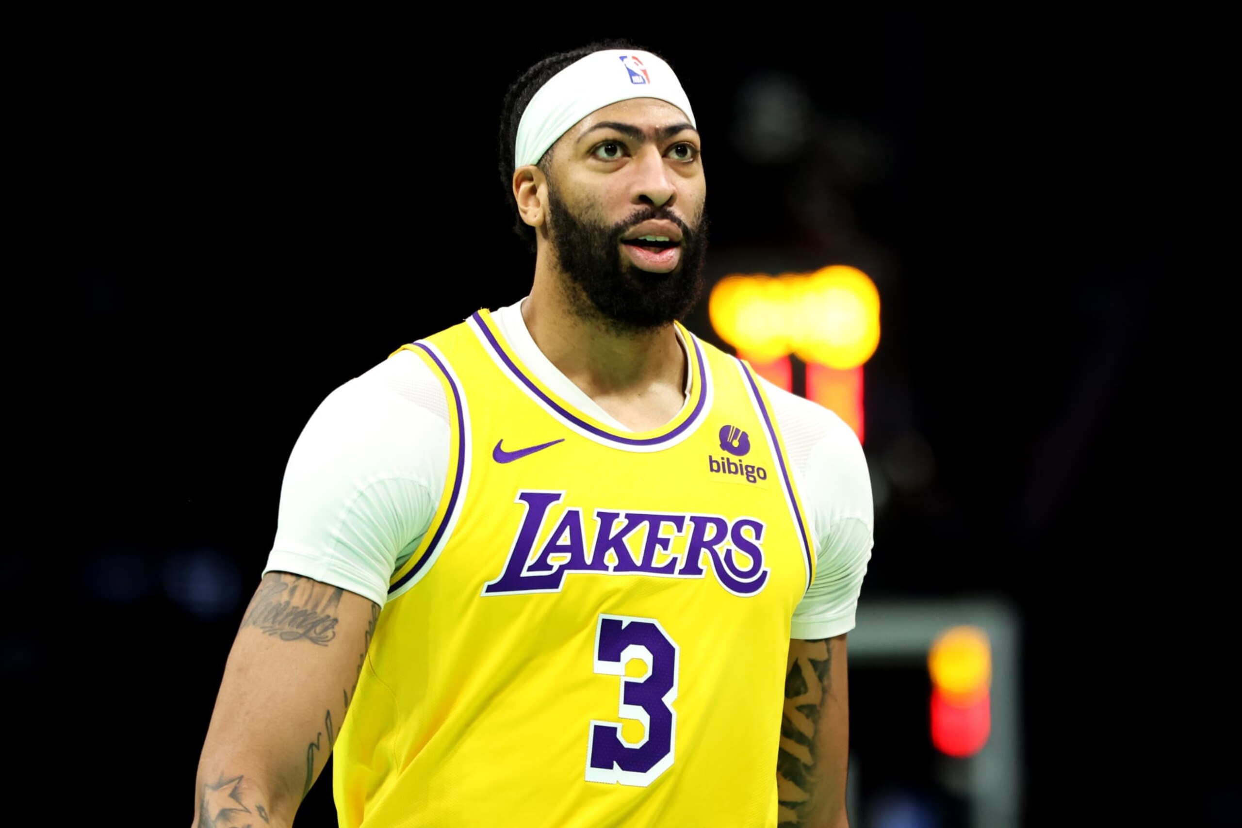 CHARLOTTE, NORTH CAROLINA - FEBRUARY 05: Anthony Davis #3 of the Los Angeles Lakers looks on during the first half of an NBA game against the Charlotte Hornets at Spectrum Center on February 05, 2024 in Charlotte, North Carolina. NOTE TO USER: User expressly acknowledges and agrees that, by downloading and or using this photograph, User is consenting to the terms and conditions of the Getty Images License Agreement. (Photo by David Jensen/Getty Images)