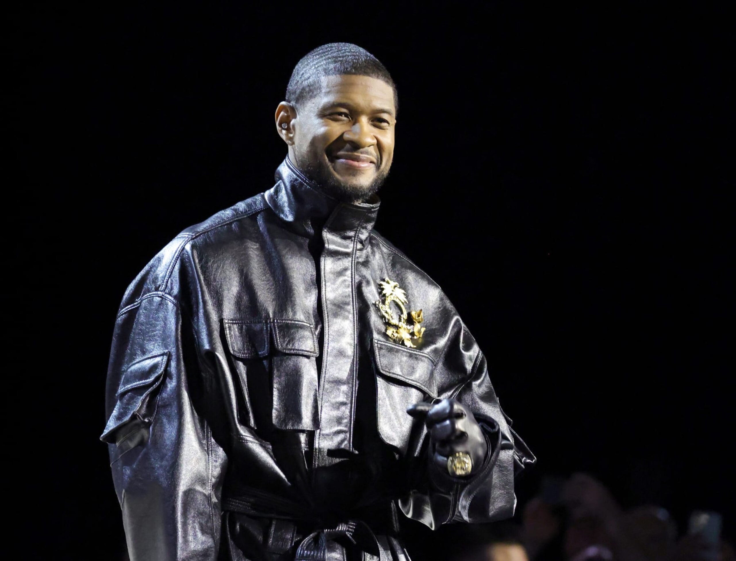 LAS VEGAS, NEVADA - FEBRUARY 08: Usher speaks onstage during the Super Bowl LVIII Pregame & Apple Music Super Bowl LVIII Halftime Show press conference at the Mandalay Bay Convention Center on February 08, 2024 in Las Vegas, Nevada. (Photo by Ethan Miller/Getty Images) LAS VEGAS, NEVADA - FEBRUARY 08: Usher speaks onstage during the Super Bowl LVIII Pregame & Apple Music Super Bowl LVIII Halftime Show press conference at the Mandalay Bay Convention Center on February 08, 2024 in Las Vegas, Nevada. (Photo by Ethan Miller/Getty Images)