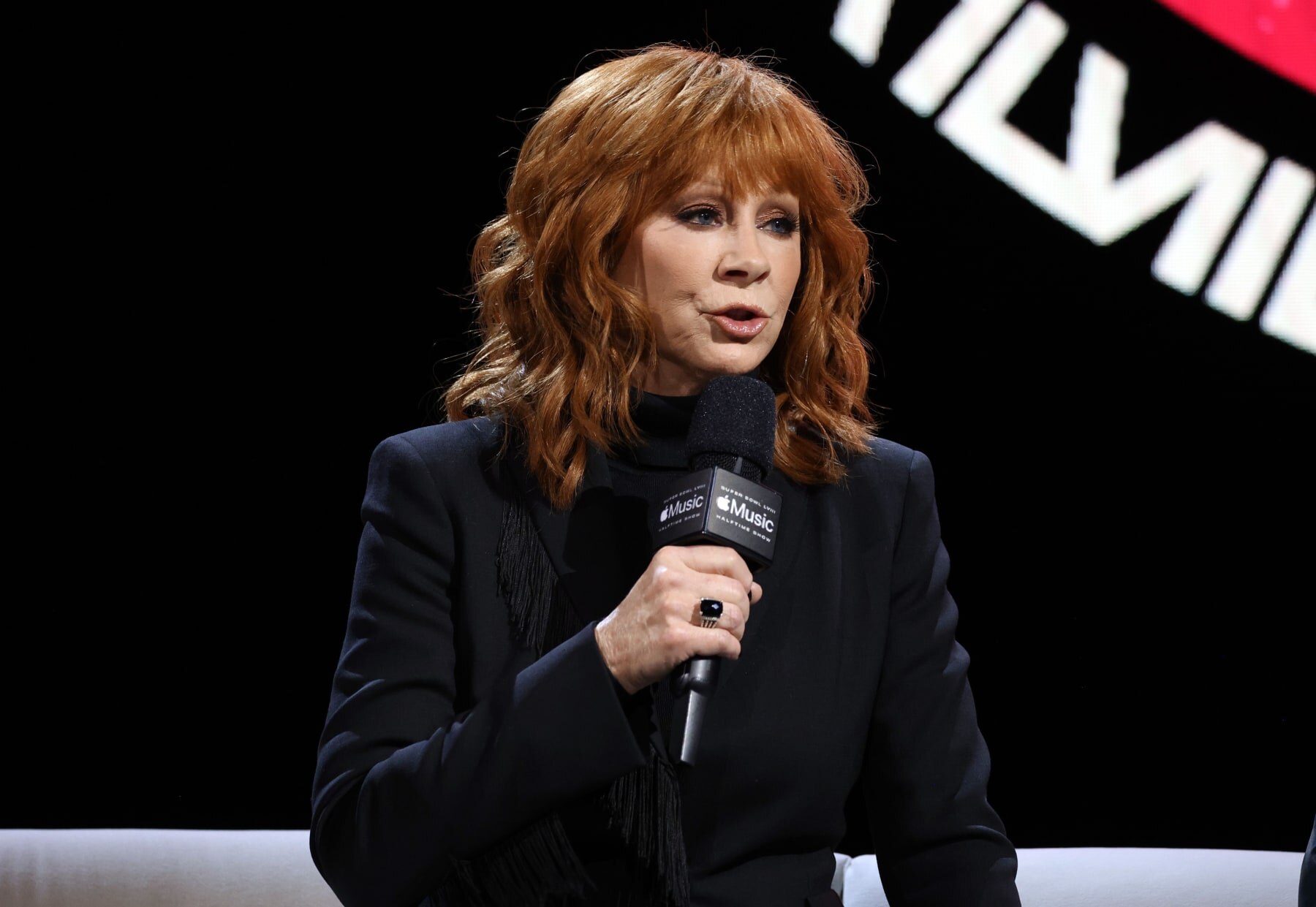 LAS VEGAS, NEVADA - FEBRUARY 08: Reba McEntire speaks during the Super Bowl LVIII Pregame & Apple Music Super Bowl LVIII Halftime Show press conference at the Mandalay Bay Convention Center on February 08, 2024 in Las Vegas, Nevada. (Photo by Kevin Mazur/Getty Images for Roc Nation)
