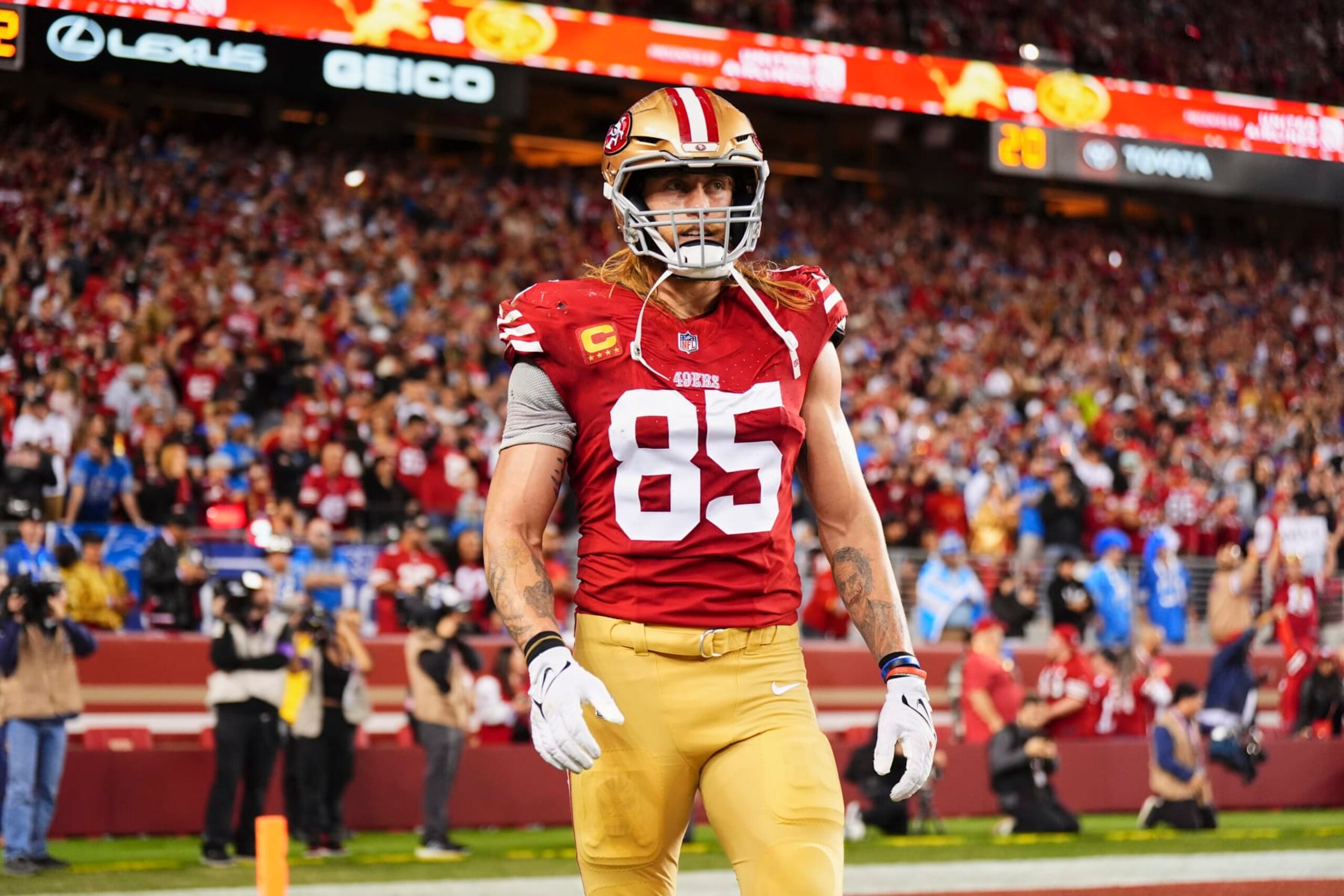 SANTA CLARA, CA - JANUARY 28: George Kittle #85 of the San Francisco 49ers celebrates after a the San Francisco 49ers scored a touchdown against the Detroit Lions during the second half of the NFC Championship football game at Levi's Stadium on January 28, 2024 in Santa Clara, California. (Photo by Cooper Neill/Getty Images)