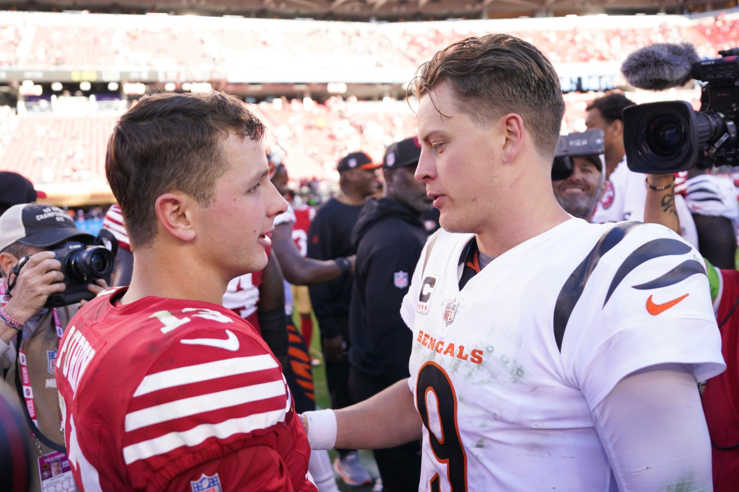 SANTA CLARA, CALIFORNIA - OCTOBER 29: Brock Purdy #13 of the San Francisco 49ers talks with Joe Burrow #9 of the Cincinnati Bengals after the game at Levi's Stadium on October 29, 2023 in Santa Clara, California. (Photo by Loren Elliott/Getty Images)