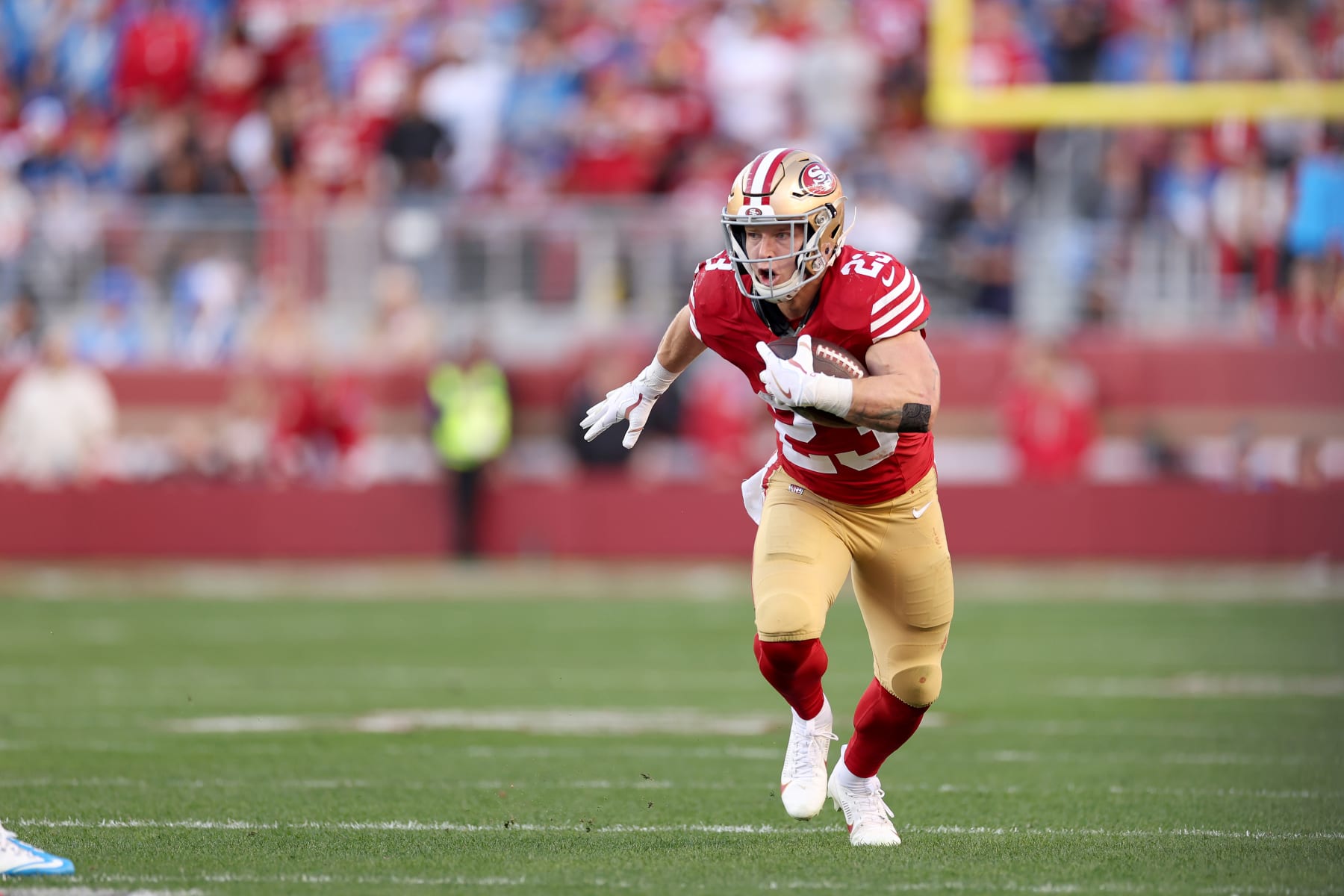 SANTA CLARA, CALIFORNIA - JANUARY 28: Christian McCaffrey #23 of the San Francisco 49ers runs with the ball against the Detroit Lions in the NFC Championship Game at Levi's Stadium on January 28, 2024 in Santa Clara, California. (Photo by Ezra Shaw/Getty Images)