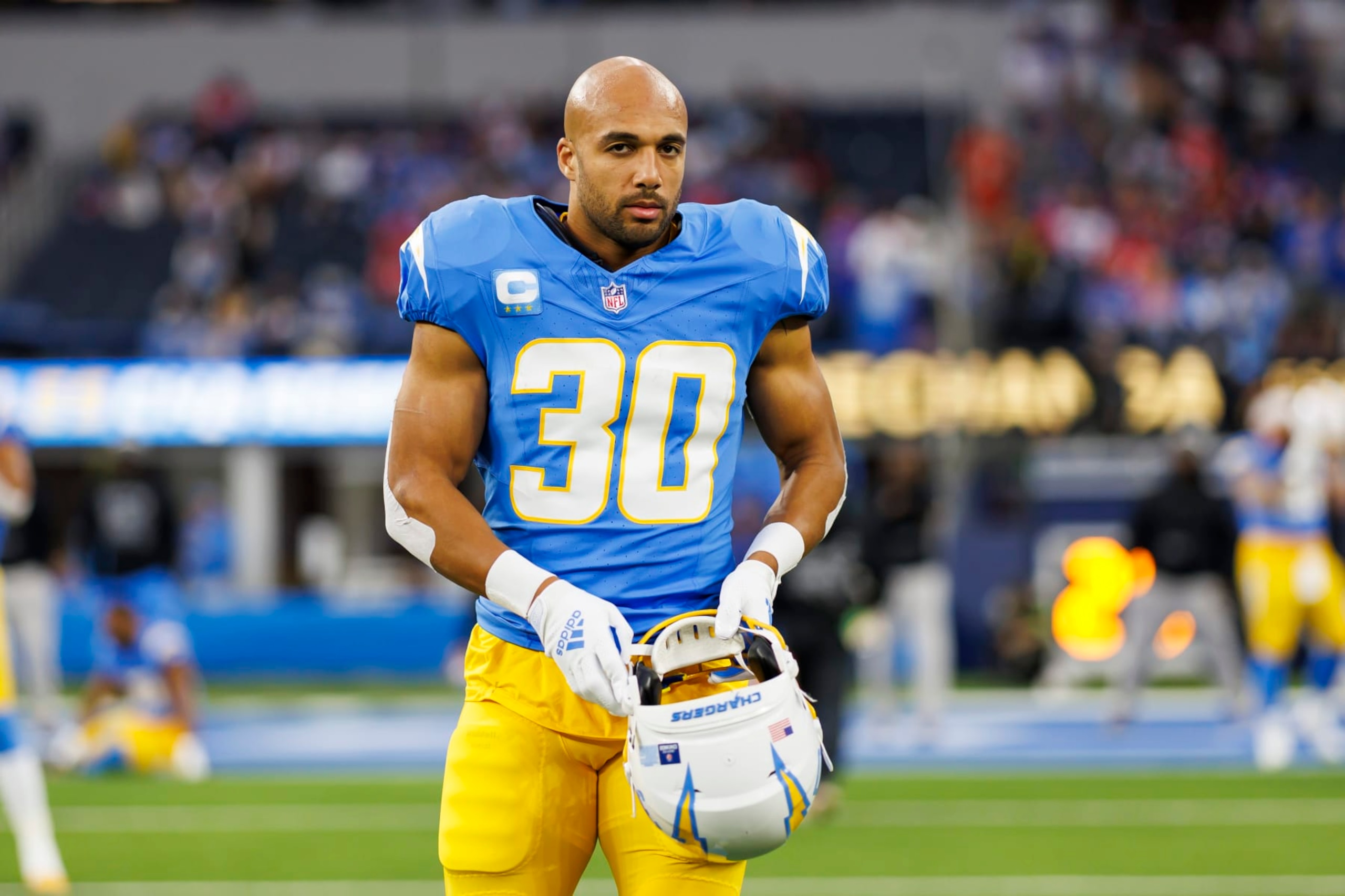 INGLEWOOD, CA - DECEMBER 23: Austin Ekeler #30 of the Los Angeles Chargers looks on during pregame warmups before an NFL football game against the Buffalo Bills at SoFi Stadium on December 23, 2023 in Inglewood, California. (Photo by Ryan Kang/Getty Images)
