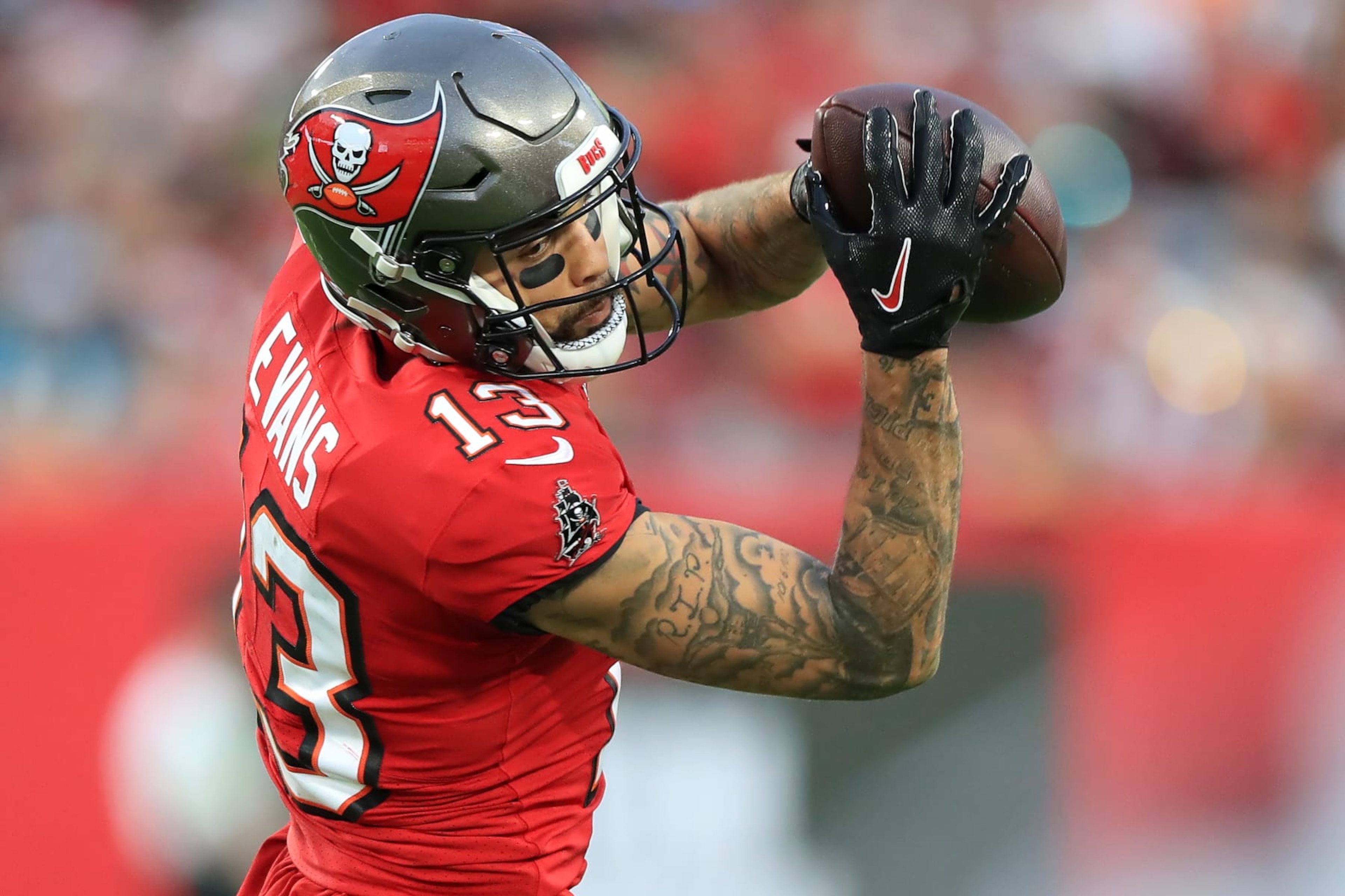 TAMPA, FL - DECEMBER 24: Tampa Bay Buccaneers Wide Receiver Mike Evans (13) makes a catch during the regular season game between the Jacksonville Jaguars and the Tampa Bay Buccaneers on December 24, 2023 at Raymond James Stadium in Tampa, Florida. (Photo by Cliff Welch/Icon Sportswire via Getty Images)