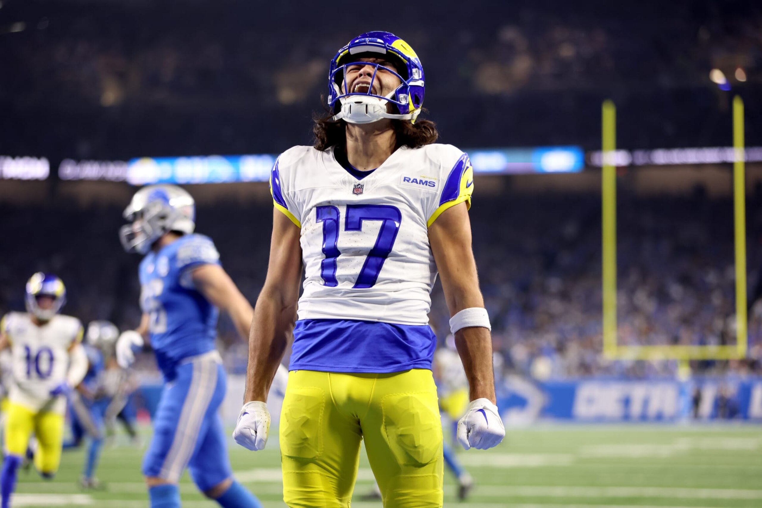 DETROIT, MICHIGAN - JANUARY 14: Puka Nacua #17 of the Los Angeles Rams celebrates after scoring a touchdown during the second quarter against the Detroit Lions in the NFC Wild Card Playoffs at Ford Field on January 14, 2024 in Detroit, Michigan. (Photo by Gregory Shamus/Getty Images)
