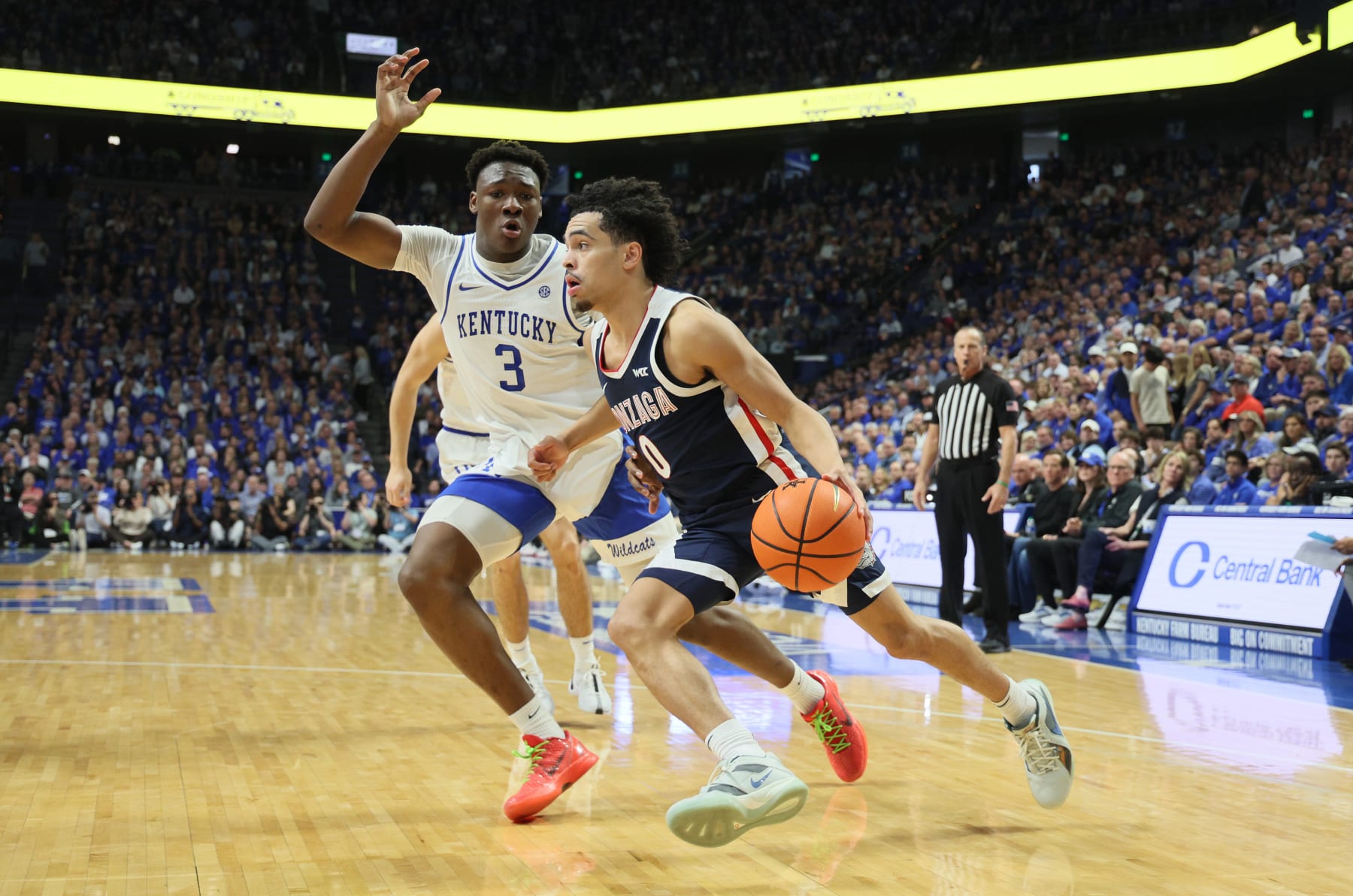 LEXINGTON, KENTUCKY - FEBRUARY 10: Ryan Nembhard #0 of the Gonzaga Bulldogs dribbles the ball while defended by Adou Thiero #3 of the Kentucky Wildcats at Rupp Arena in the first half on February 10, 2024 in Lexington, Kentucky. (Photo by Andy Lyons/Getty Images)