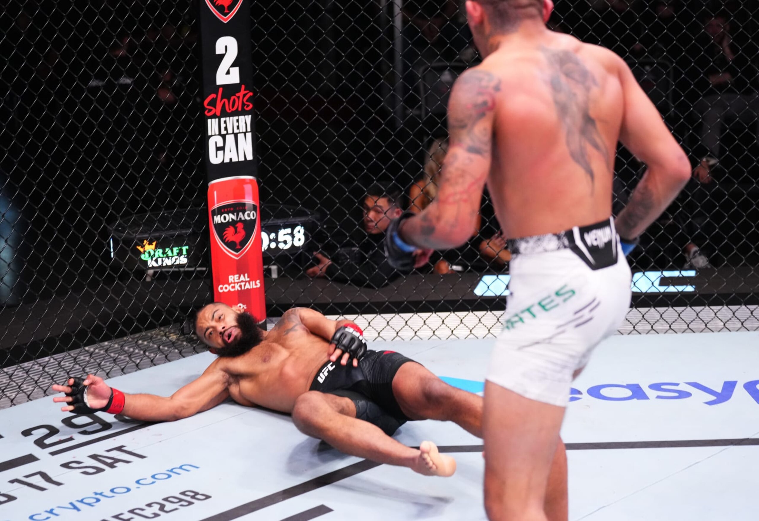 LAS VEGAS, NEVADA - FEBRUARY 10: (R-L) Carlos Prates of Brazil knocks out Trevin Giles in a welterweight fight during the UFC Fight Night event at UFC APEX on February 10, 2024 in Las Vegas, Nevada. (Photo by Jeff Bottari/Zuffa LLC via Getty Images)