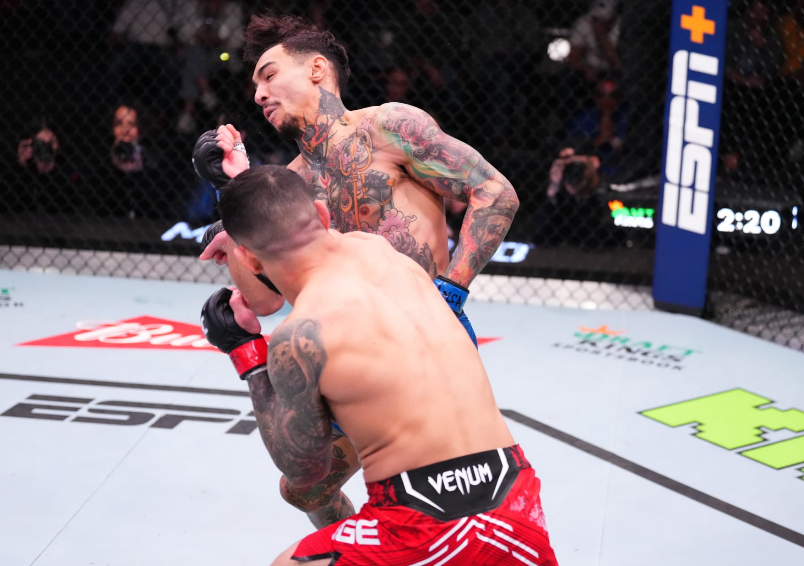 LAS VEGAS, NEVADA - FEBRUARY 10: Dan Ige knocks out Andre Fili in a featherweight fight during the UFC Fight Night event at UFC APEX on February 10, 2024 in Las Vegas, Nevada. (Photo by Jeff Bottari/Zuffa LLC via Getty Images)
