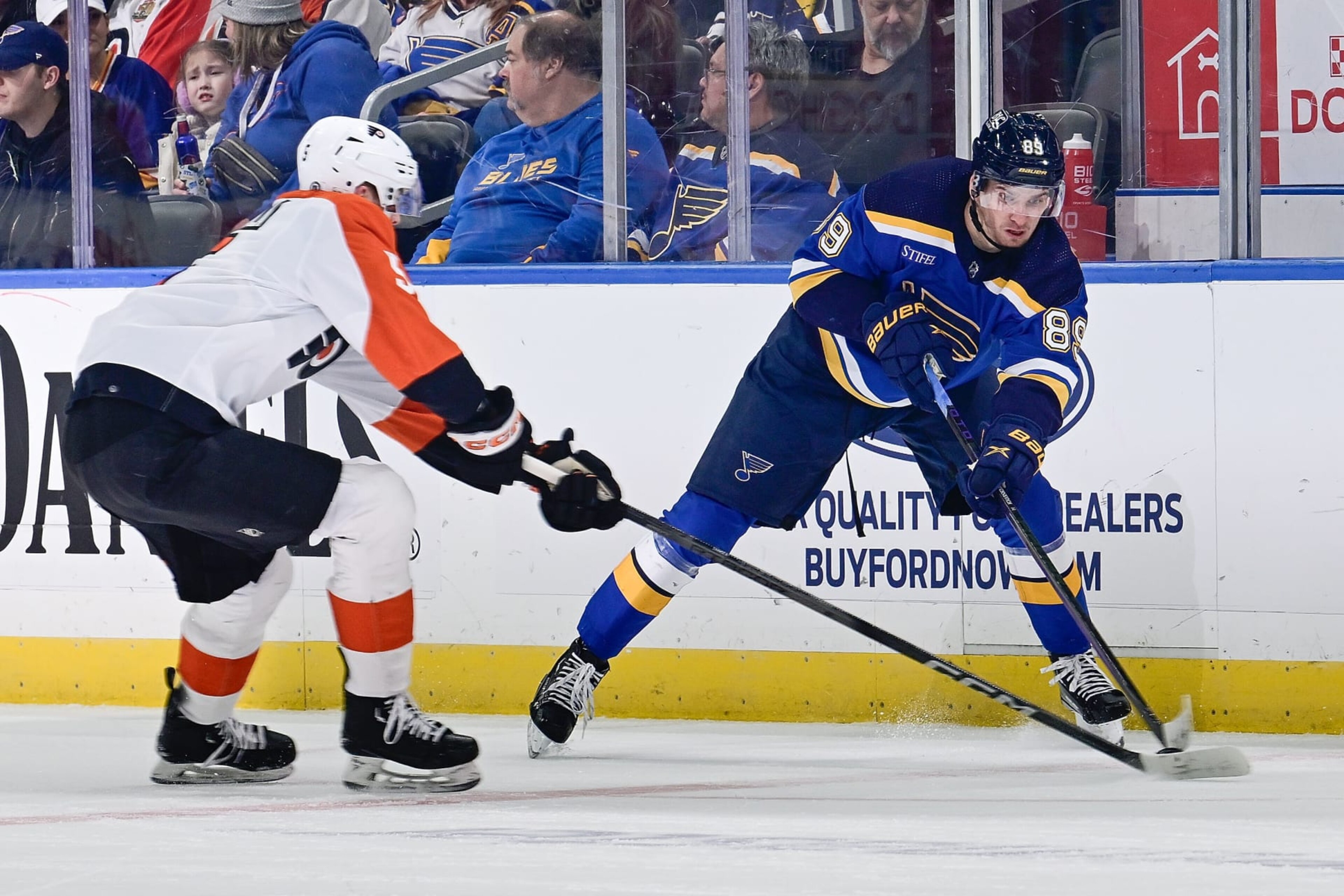 ST. LOUIS, MO - JANUARY 15: Pavel Buchnevich #89 of the St. Louis Blues attempts a pass against the Philadelphia Flyers on January 15, 2024 at the Enterprise Center in St. Louis, Missouri. (Photo by Scott Rovak/NHLI via Getty Images)