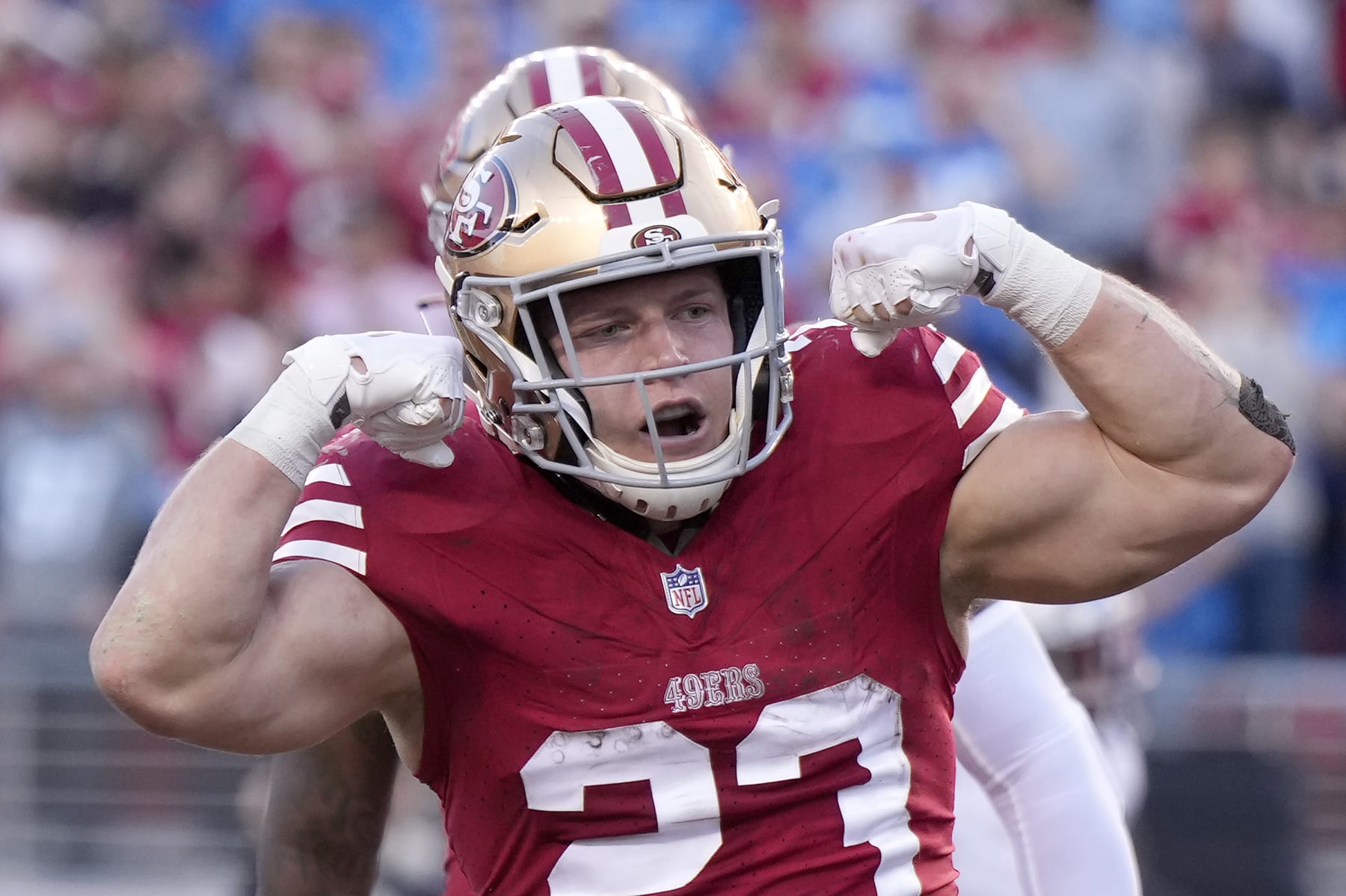 SANTA CLARA, CALIFORNIA - JANUARY 28: Christian McCaffrey #23 of the San Francisco 49ers celebrates after scoring a touchdown during the second quarter against the Detroit Lions in the NFC Championship Game at Levi's Stadium on January 28, 2024 in Santa Clara, California. (Photo by Thearon W. Henderson/Getty Images)