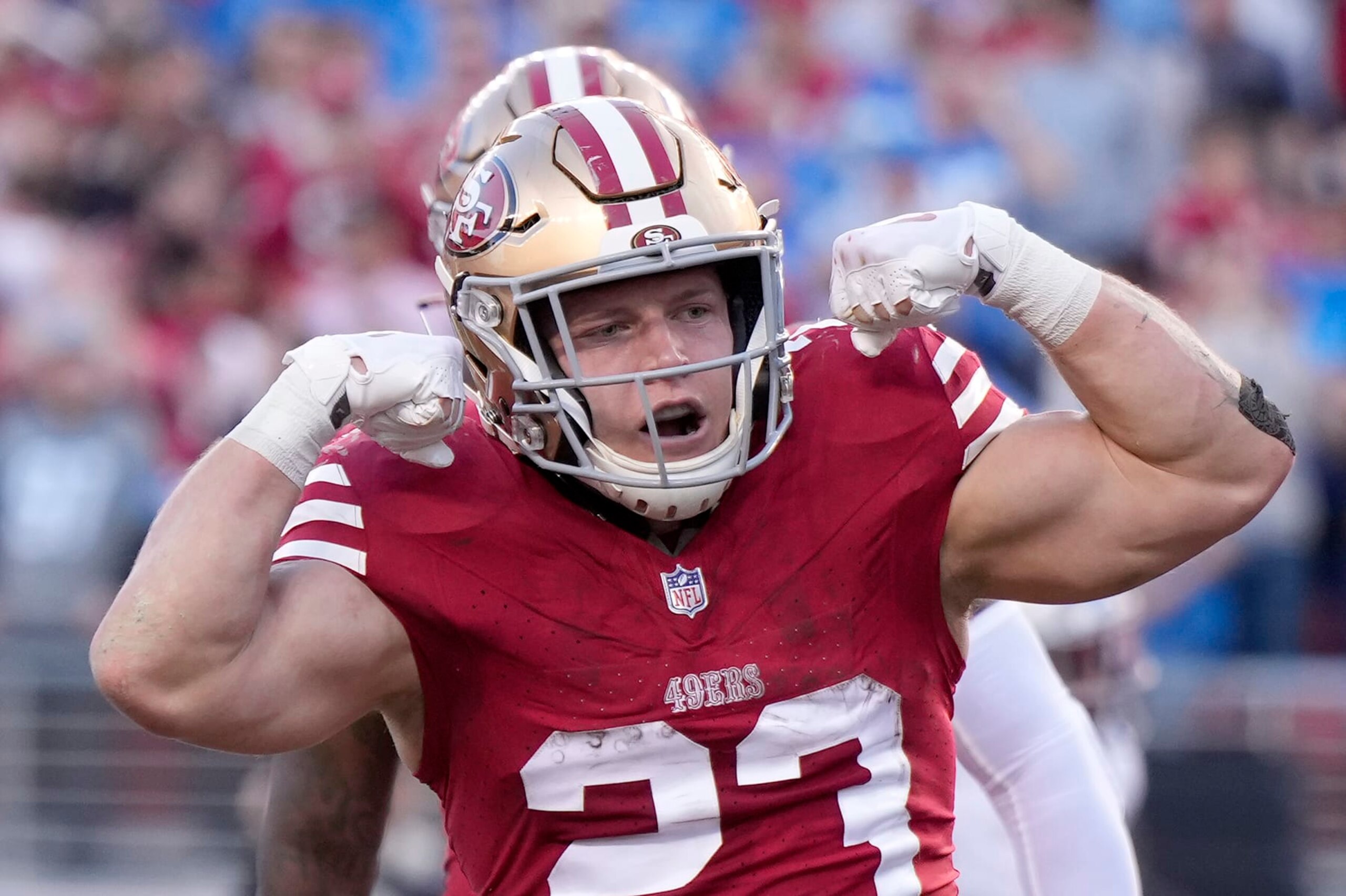SANTA CLARA, CALIFORNIA - JANUARY 28: Christian McCaffrey #23 of the San Francisco 49ers celebrates after scoring a touchdown during the second quarter against the Detroit Lions in the NFC Championship Game at Levi's Stadium on January 28, 2024 in Santa Clara, California. (Photo by Thearon W. Henderson/Getty Images) SANTA CLARA, CALIFORNIA - JANUARY 28: Christian McCaffrey #23 of the San Francisco 49ers celebrates after scoring a touchdown during the second quarter against the Detroit Lions in the NFC Championship Game at Levi's Stadium on January 28, 2024 in Santa Clara, California. (Photo by Thearon W. Henderson/Getty Images)