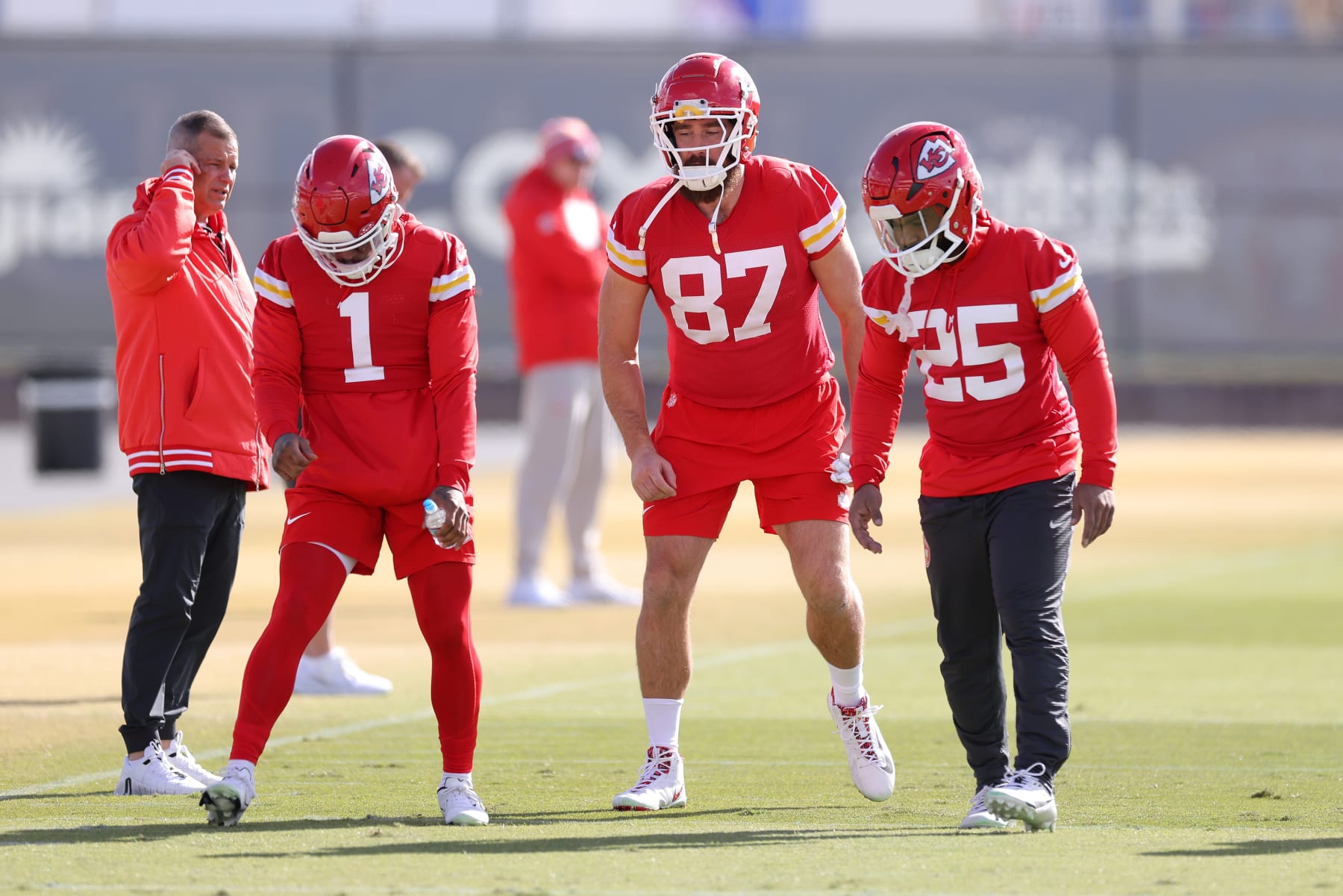 HENDERSON, NEVADA - FEBRUARY 08: Travis Kelce #87 of the Kansas City Chiefs warms up with Clyde Edwards-Helaire #25 and Jerick McKinnon #1 during Kansas City Chiefs practice ahead of Super Bowl LVIII at the Las Vegas Raiders Headquarters/Intermountain Healthcare Performance Center on February 08, 2024 in Henderson, Nevada. (Photo by Jamie Squire/Getty Images)