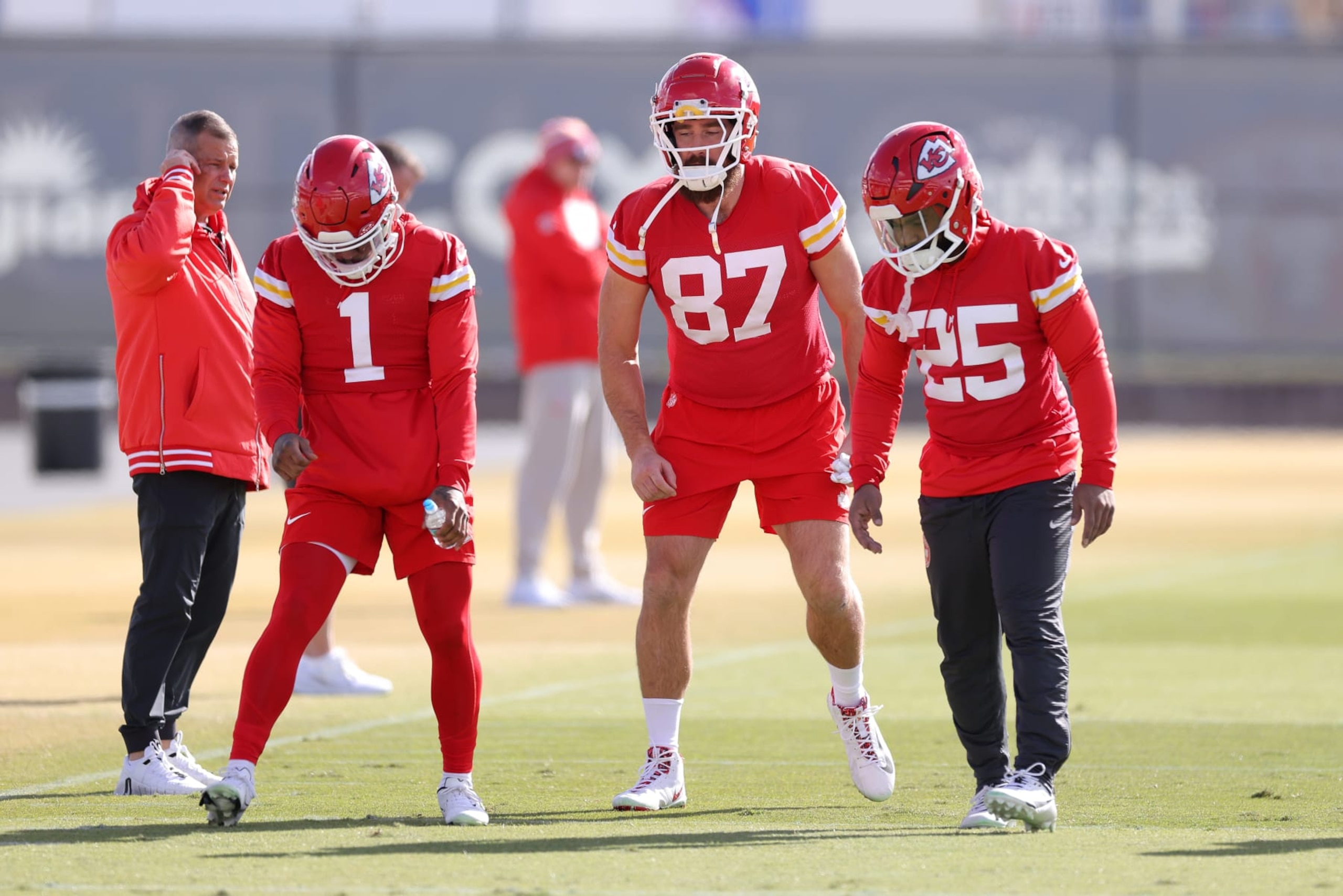 HENDERSON, NEVADA - FEBRUARY 08: Travis Kelce #87 of the Kansas City Chiefs warms up with Clyde Edwards-Helaire #25 and Jerick McKinnon #1 during Kansas City Chiefs practice ahead of Super Bowl LVIII at the Las Vegas Raiders Headquarters/Intermountain Healthcare Performance Center on February 08, 2024 in Henderson, Nevada. (Photo by Jamie Squire/Getty Images) HENDERSON, NEVADA - FEBRUARY 08: Travis Kelce #87 of the Kansas City Chiefs warms up with Clyde Edwards-Helaire #25 and Jerick McKinnon #1 during Kansas City Chiefs practice ahead of Super Bowl LVIII at the Las Vegas Raiders Headquarters/Intermountain Healthcare Performance Center on February 08, 2024 in Henderson, Nevada. (Photo by Jamie Squire/Getty Images)