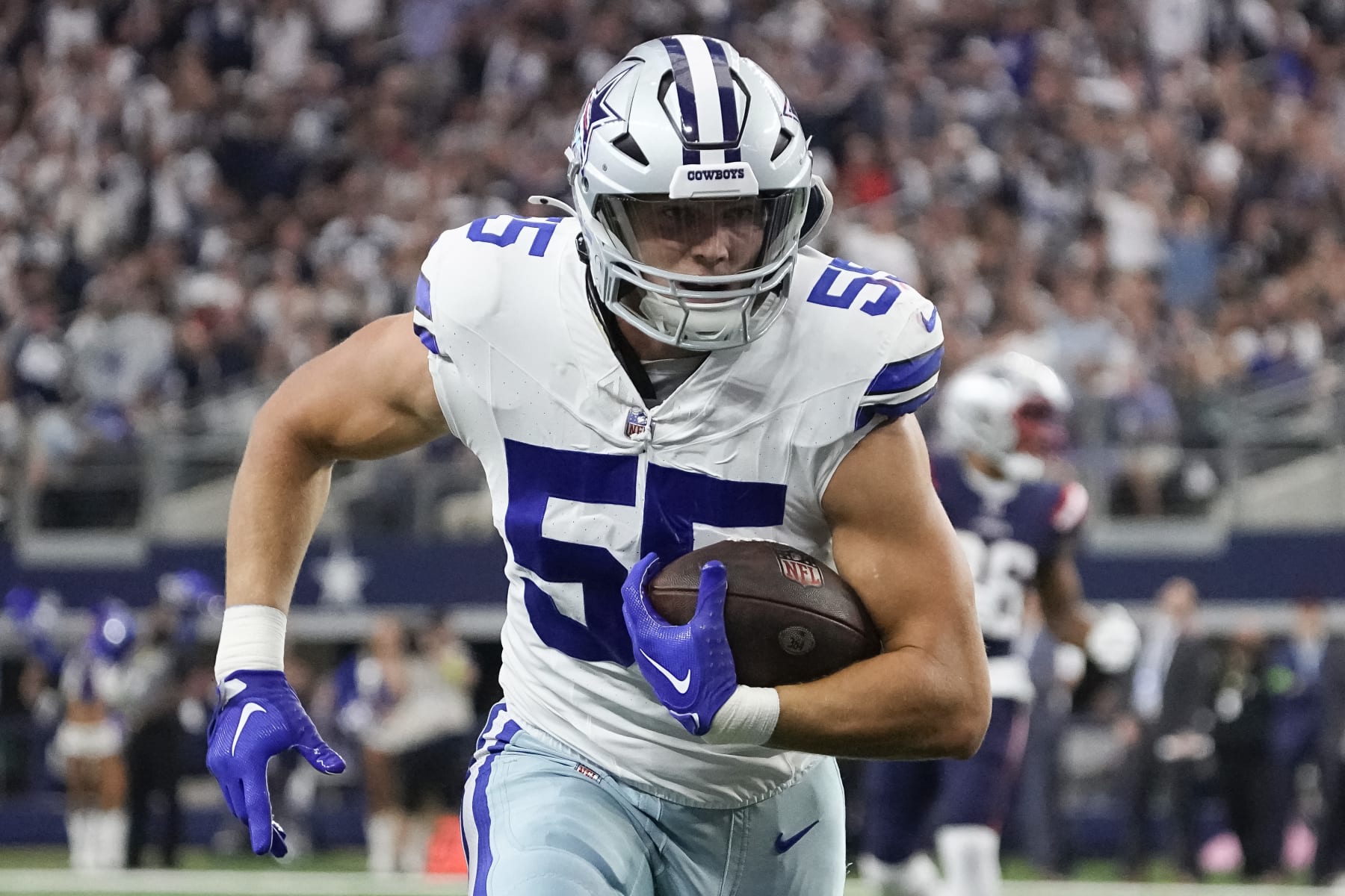ARLINGTON, TEXAS - OCTOBER 01: Leighton Vander Esch #55 of the Dallas Cowboys runs with the ball after recovering a fumble during the first half against the New England Patriots at AT&T Stadium on October 01, 2023 in Arlington, Texas. (Photo by Sam Hodde/Getty Images)