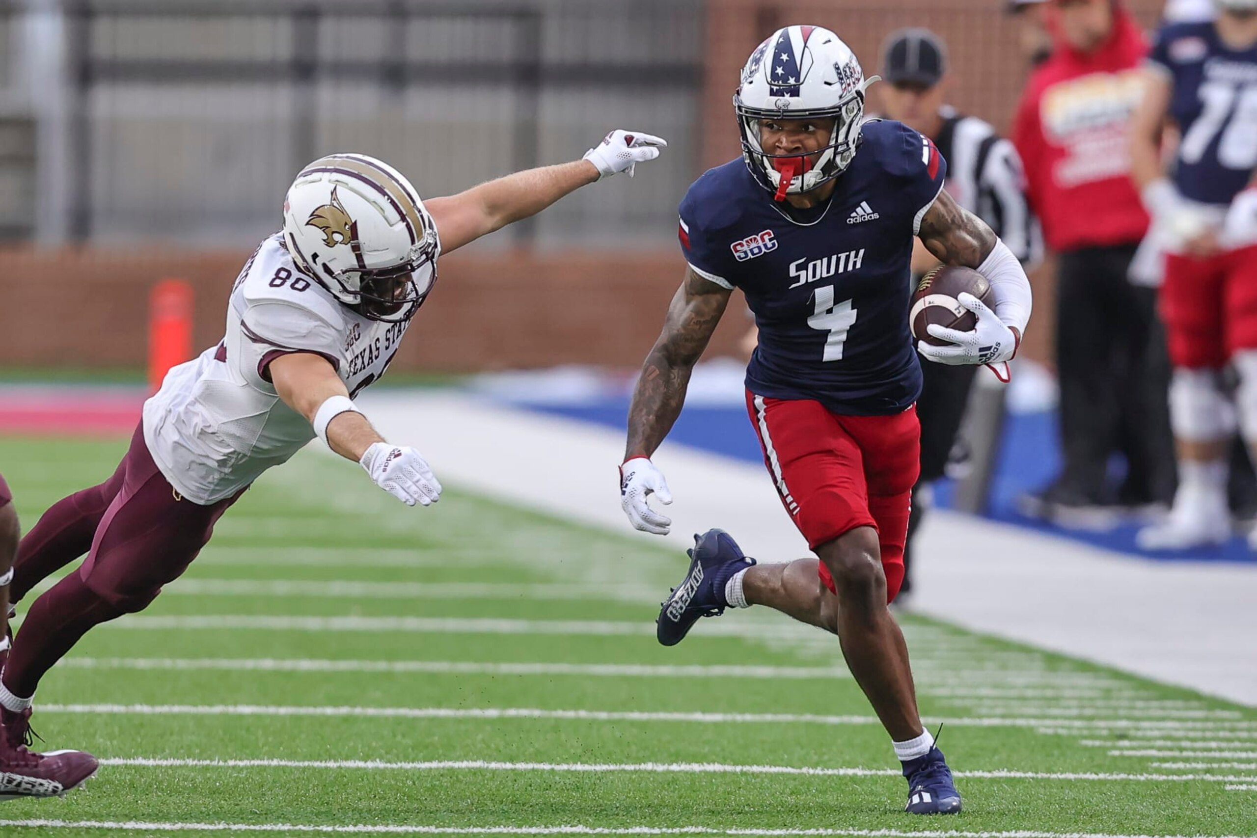 MOBILE, AL - NOVEMBER 12: South Alabama Jaguars wide receiver Caullin Lacy (4) returns a kickoff during a college football game between the Texas State Bobcats and the South Alabama Jaguars on November 12, 2022, at Hancock-Whitney Stadium, in Mobile, Alabama. (Photo by Bobby McDuffie/Icon Sportswire via Getty Images)