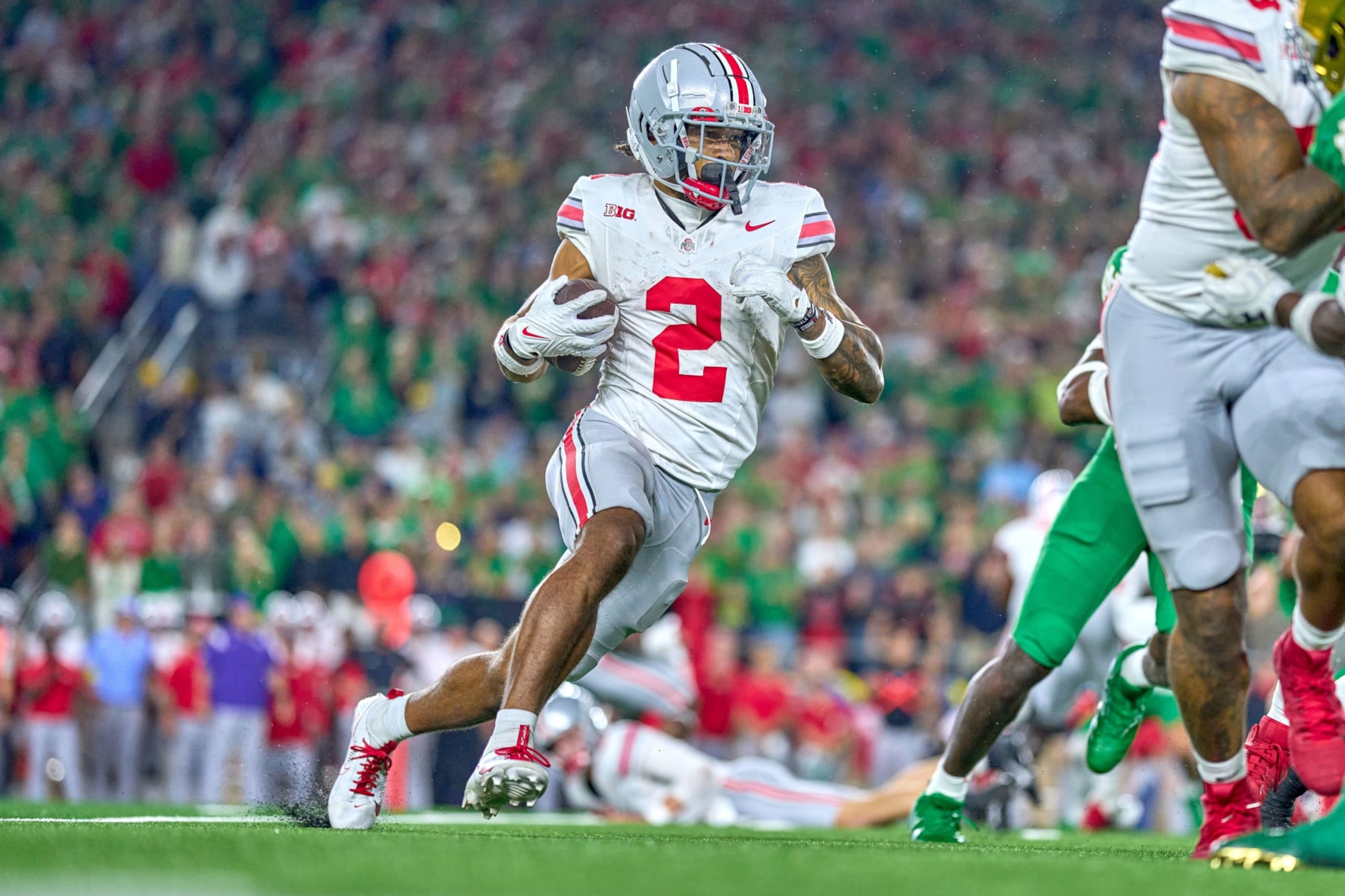 SOUTH BEND, IN - SEPTEMBER 23: Ohio State Buckeyes wide receiver Emeka Egbuka (2) runs with the football in action during a football game between the Notre Dame Fighting Irish and the Ohio State Buckeyes on September 23, 2023 at Notre Dame Stadium in South Bend, IN. (Photo by Robin Alam/Icon Sportswire via Getty Images)