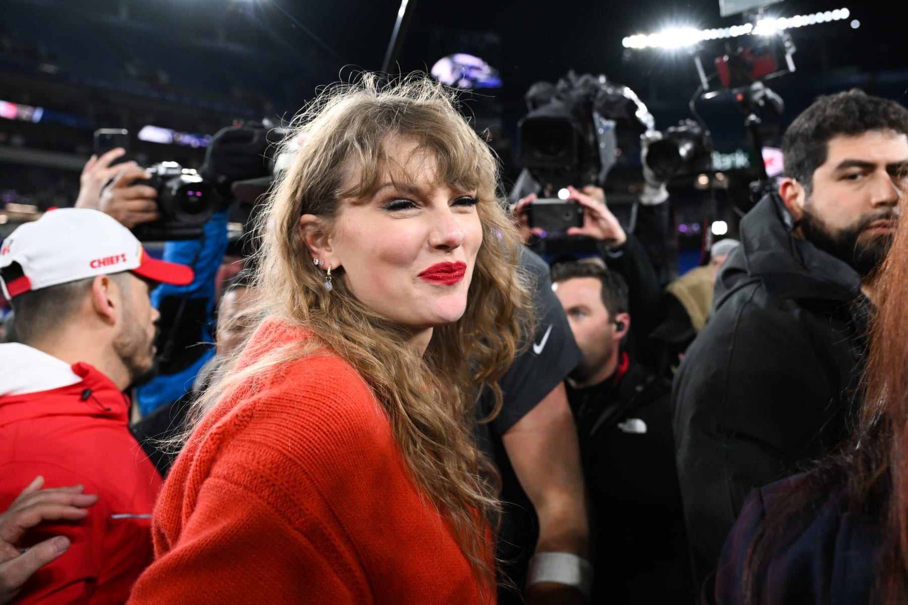 BALTIMORE, MD - JANUARY 28: Taylor Swift walks off the field following the AFC Championship between the Kansas City Chiefs and the Baltimore Ravens at M&T Bank Stadium on January 28, 2024 in Baltimore, Maryland. (Photo by Kathryn Riley/Getty Images)