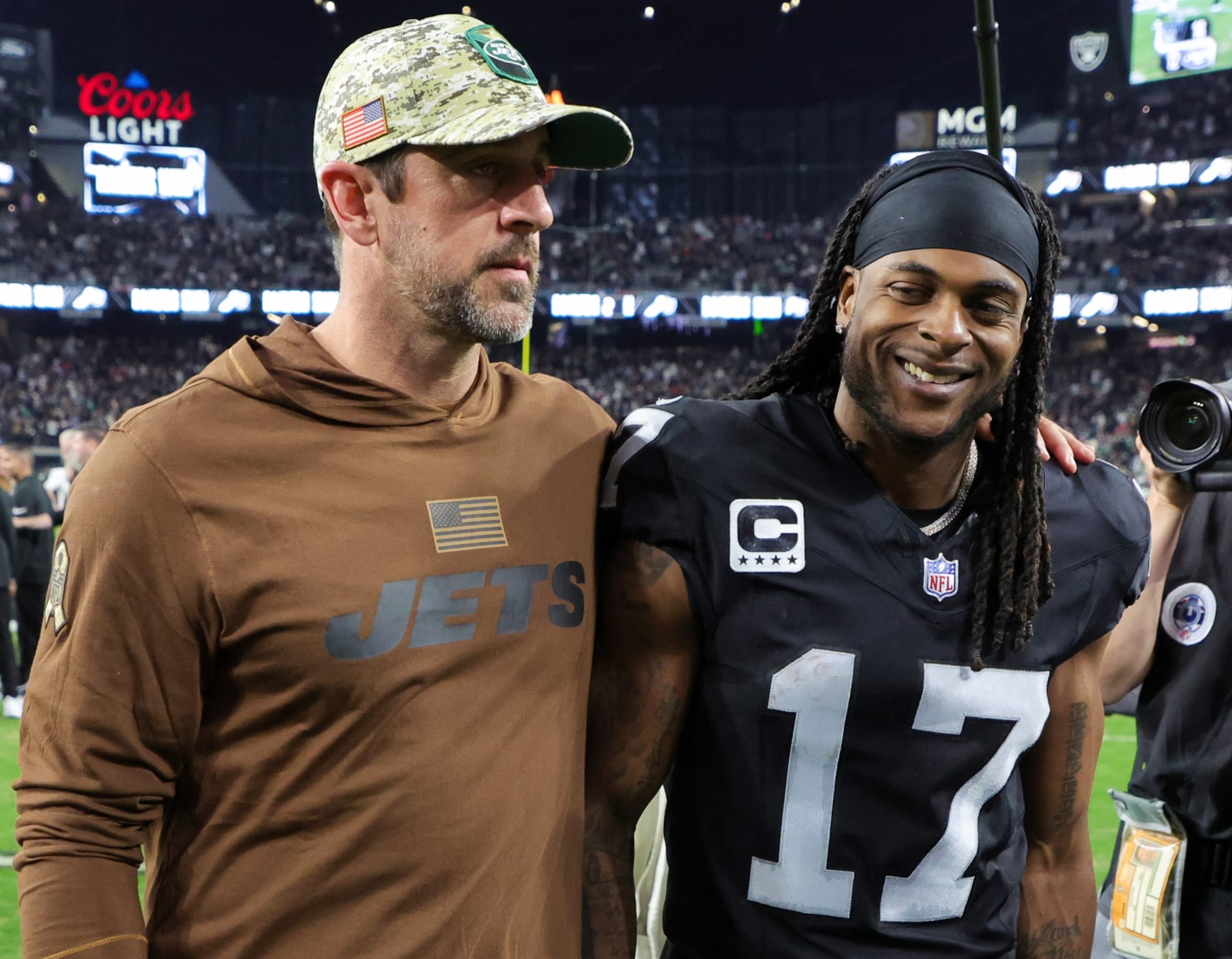 LAS VEGAS, NEVADA - NOVEMBER 12: Quarterback Aaron Rodgers #8 of the New York Jets and wide receiver Davante Adams #17 of the Las Vegas Raiders visit on the field after the Raiders' 16-12 victory over the Jets at Allegiant Stadium on November 12, 2023 in Las Vegas, Nevada. (Photo by Ethan Miller/Getty Images) LAS VEGAS, NEVADA - NOVEMBER 12: Quarterback Aaron Rodgers #8 of the New York Jets and wide receiver Davante Adams #17 of the Las Vegas Raiders visit on the field after the Raiders' 16-12 victory over the Jets at Allegiant Stadium on November 12, 2023 in Las Vegas, Nevada. (Photo by Ethan Miller/Getty Images)