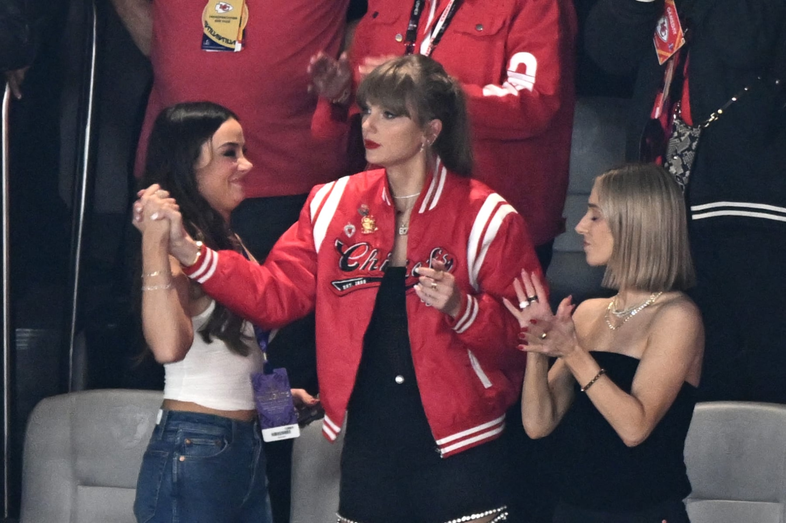 US singer-songwriter Taylor Swift (C) and Ashley Avignone (R) attend Super Bowl LVIII between the Kansas City Chiefs and the San Francisco 49ers at Allegiant Stadium in Las Vegas, Nevada, February 11, 2024. (Photo by Patrick T. Fallon / AFP) (Photo by PATRICK T. FALLON/AFP via Getty Images)
