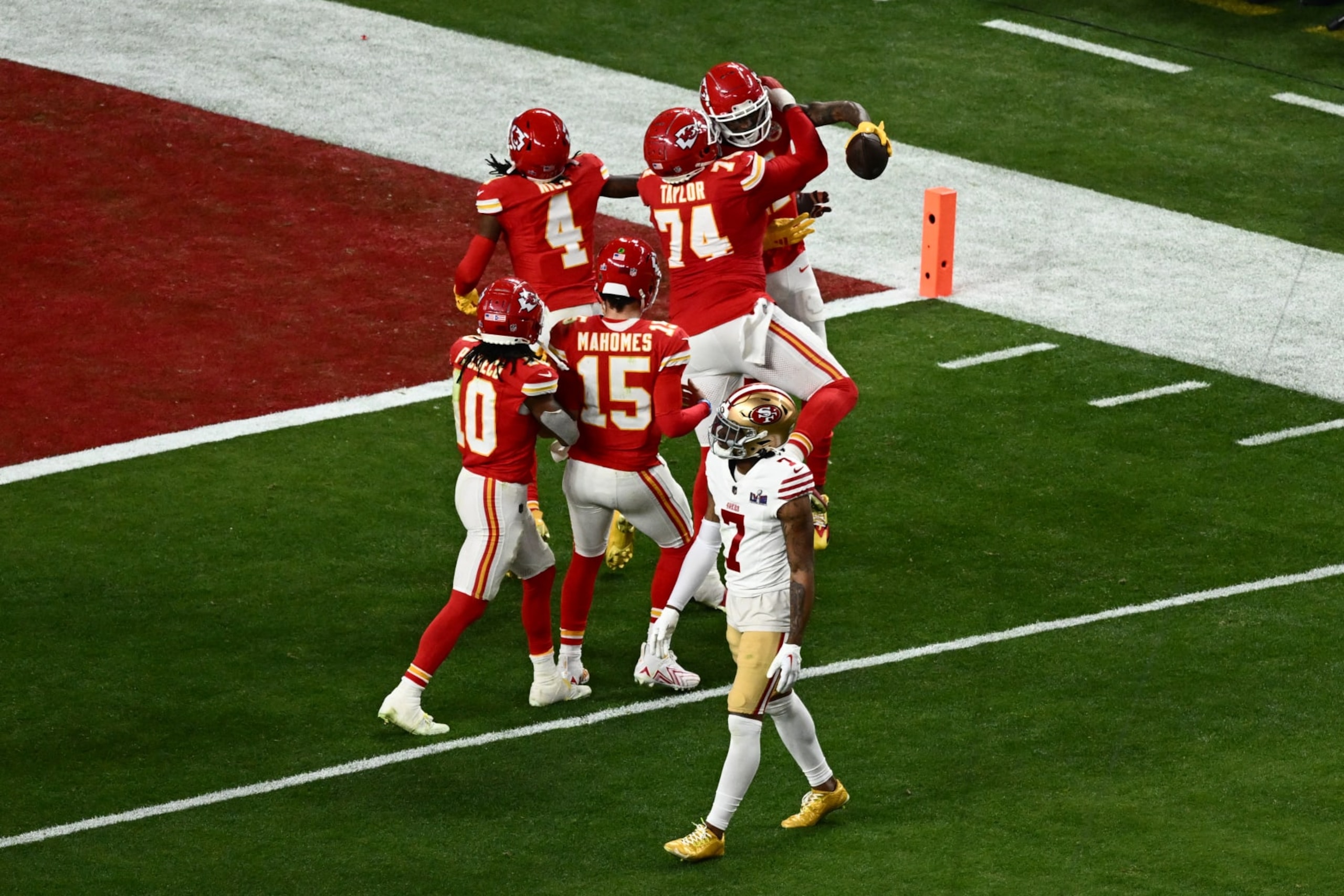 Kansas City Chiefs' wide receiver #11 Marquez Valdes-Scantling (top) celebrates with teammates after scoring a touchdown during Super Bowl LVIII between the Kansas City Chiefs and the San Francisco 49ers at Allegiant Stadium in Las Vegas, Nevada, February 11, 2024. (Photo by Patrick T. Fallon / AFP) (Photo by PATRICK T. FALLON/AFP via Getty Images) Kansas City Chiefs' wide receiver #11 Marquez Valdes-Scantling (top) celebrates with teammates after scoring a touchdown during Super Bowl LVIII between the Kansas City Chiefs and the San Francisco 49ers at Allegiant Stadium in Las Vegas, Nevada, February 11, 2024. (Photo by Patrick T. Fallon / AFP) (Photo by PATRICK T. FALLON/AFP via Getty Images)