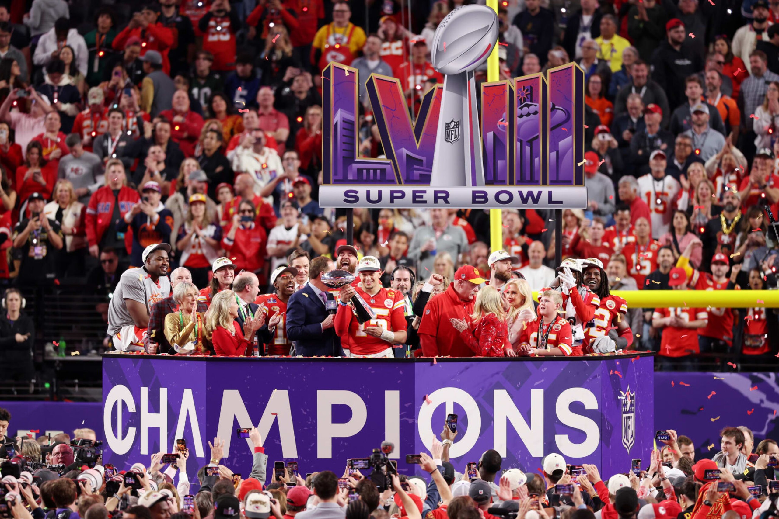 LAS VEGAS, NEVADA - FEBRUARY 11: Patrick Mahomes #15 of the Kansas City Chiefs holds the Lombardi Trophy after defeating the San Francisco 49ers 25-22 in overtime during Super Bowl LVIII at Allegiant Stadium on February 11, 2024 in Las Vegas, Nevada. (Photo by Steph Chambers/Getty Images)