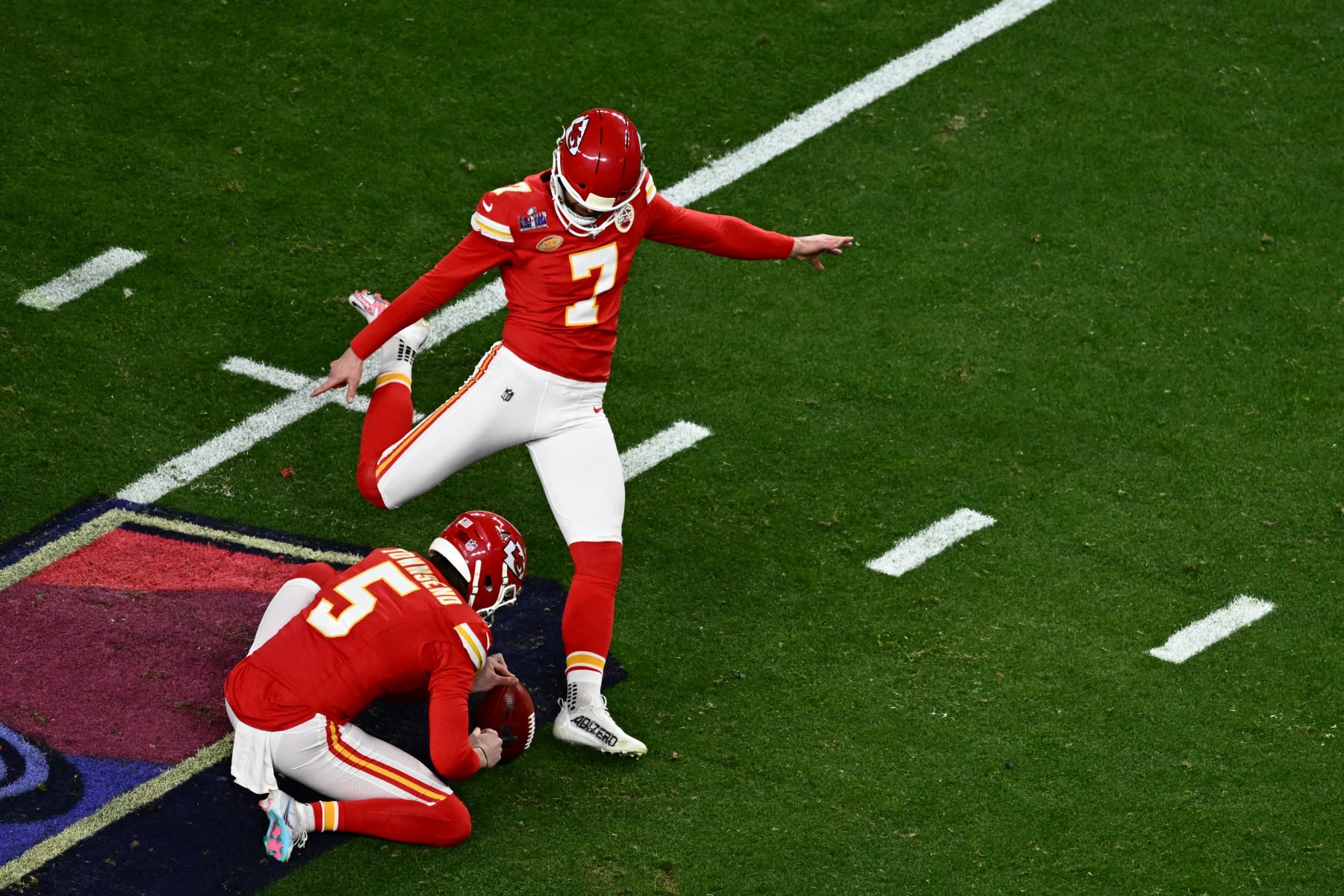 Kansas City Chiefs' kicker #07 Harrison Butker kicks the ball during Super Bowl LVIII between the Kansas City Chiefs and the San Francisco 49ers at Allegiant Stadium in Las Vegas, Nevada, February 11, 2024. (Photo by Patrick T. Fallon / AFP) (Photo by PATRICK T. FALLON/AFP via Getty Images)