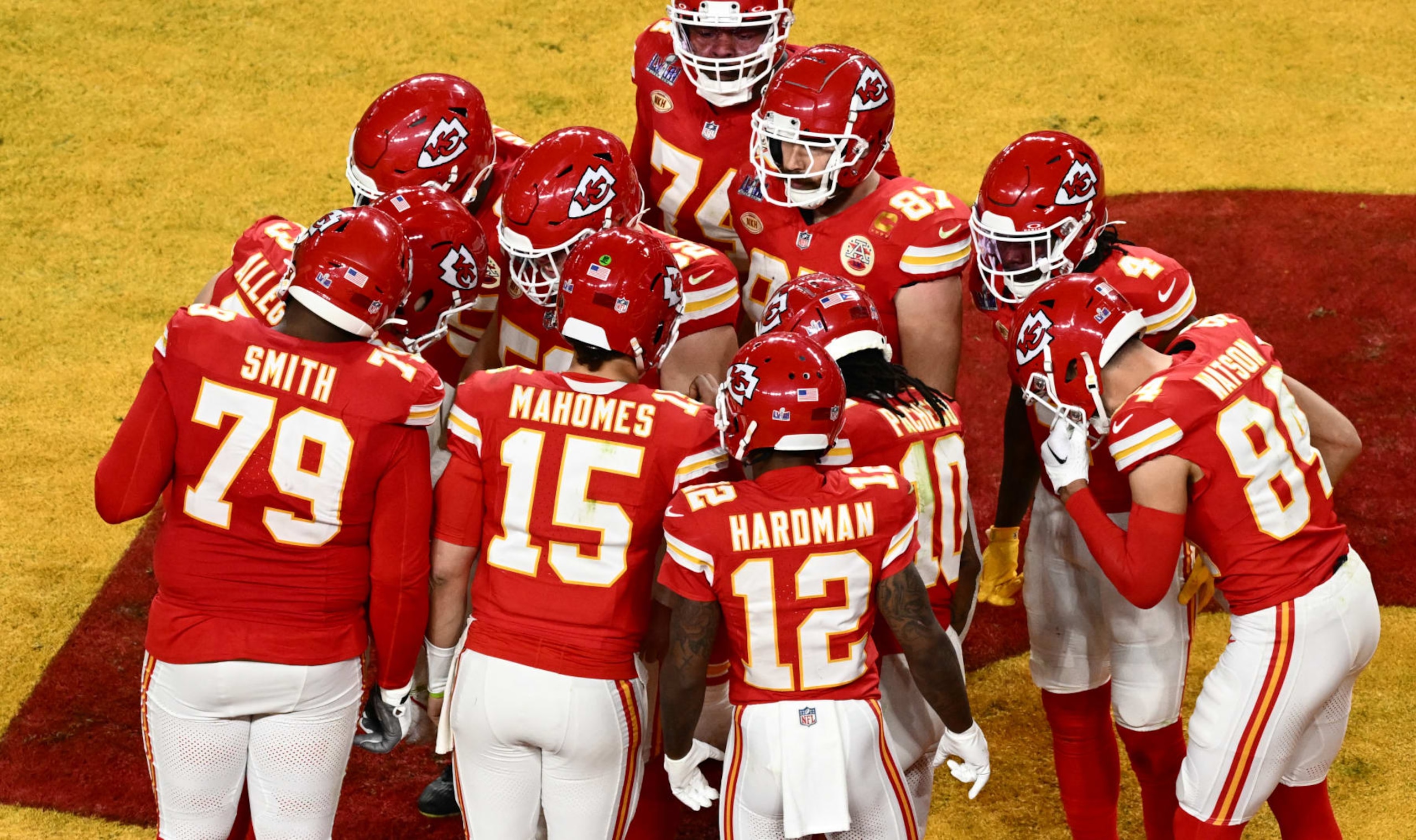 Kansas City Chiefs' players huddle during Super Bowl LVIII between the Kansas City Chiefs and the San Francisco 49ers at Allegiant Stadium in Las Vegas, Nevada, February 11, 2024. (Photo by Patrick T. Fallon / AFP) (Photo by PATRICK T. FALLON/AFP via Getty Images)