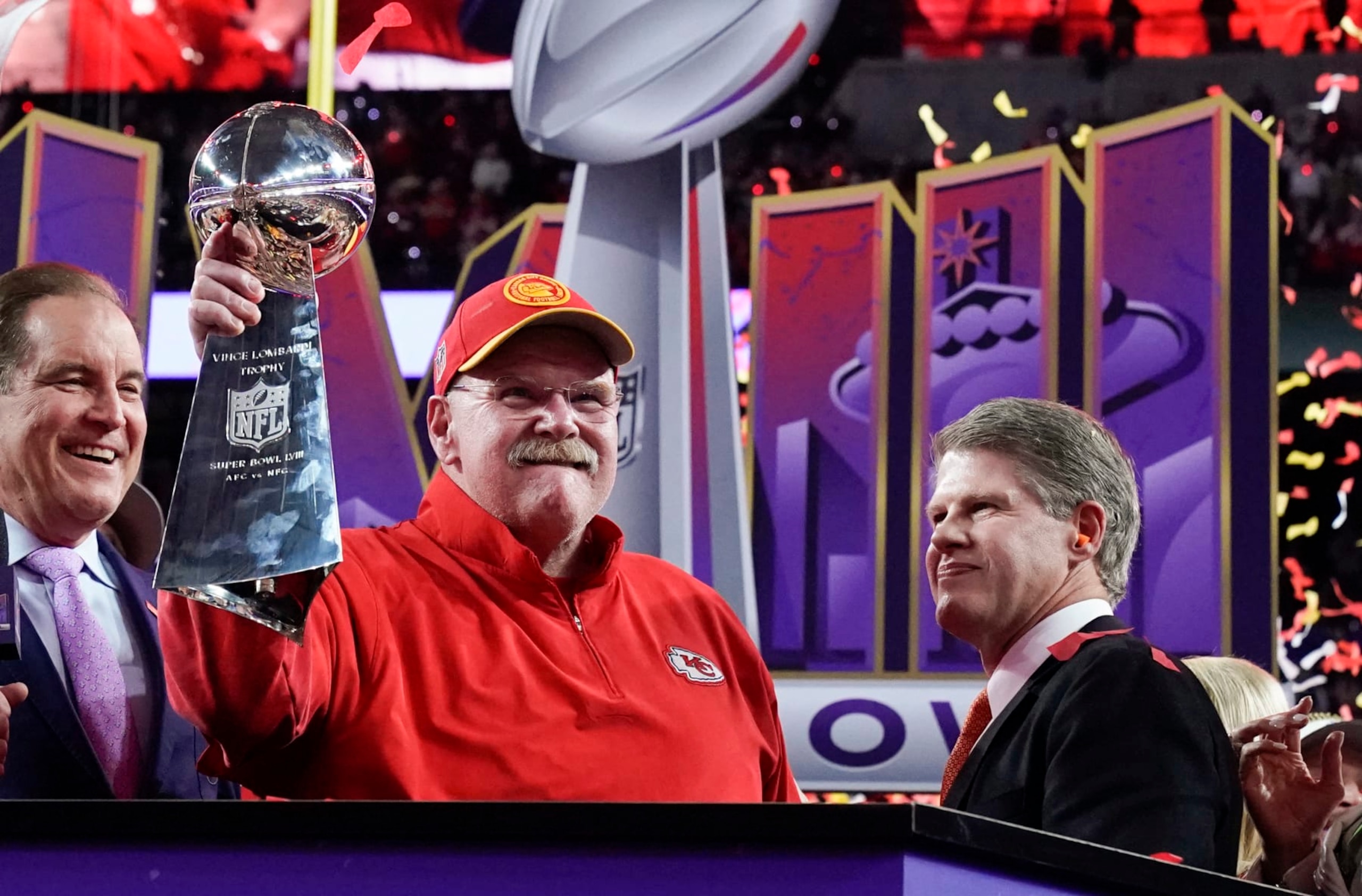Kansas City Chiefs' head coach Andy Reid holds the trophy next to Kansas City Chiefs' owner, chairman and CEO Clark Hunt as they celebrate winning Super Bowl LVIII against the San Francisco 49ers at Allegiant Stadium in Las Vegas, Nevada, February 11, 2024. (Photo by TIMOTHY A. CLARY / AFP) (Photo by TIMOTHY A. CLARY/AFP via Getty Images)