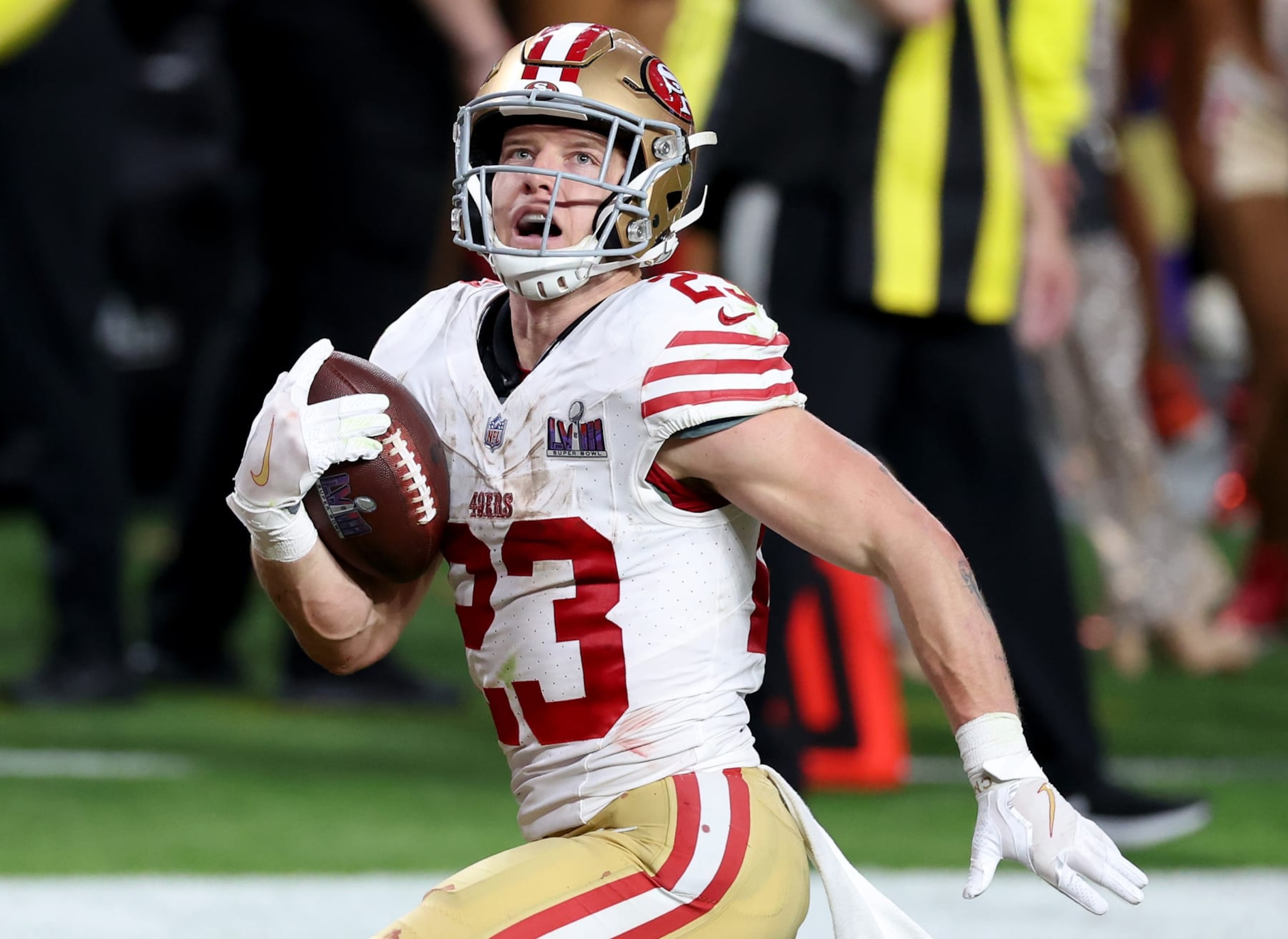 LAS VEGAS, NEVADA - FEBRUARY 11: Christian McCaffrey #23 of the San Francisco 49ers runs the ball for a touchdown in the second quarter against the Kansas City Chiefs during Super Bowl LVIII at Allegiant Stadium on February 11, 2024 in Las Vegas, Nevada. (Photo by Steph Chambers/Getty Images)