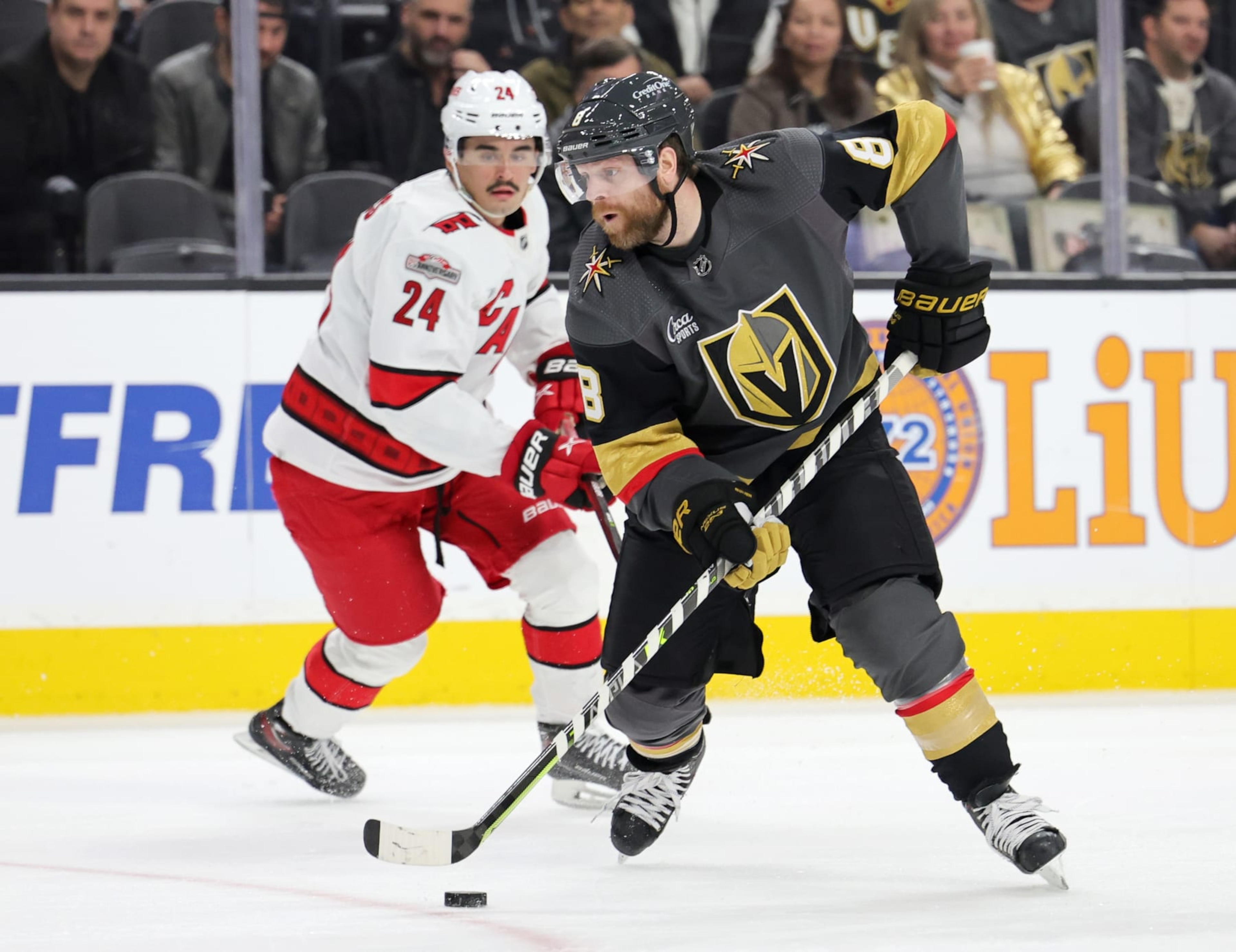 LAS VEGAS, NEVADA - MARCH 01: Phil Kessel #8 of the Vegas Golden Knights skates with the puck ahead of Seth Jarvis #24 of the Carolina Hurricanes in the second period of their game at T-Mobile Arena on March 01, 2023 in Las Vegas, Nevada. The Golden Knights defeated the Hurricanes 3-2. (Photo by Ethan Miller/Getty Images) LAS VEGAS, NEVADA - MARCH 01: Phil Kessel #8 of the Vegas Golden Knights skates with the puck ahead of Seth Jarvis #24 of the Carolina Hurricanes in the second period of their game at T-Mobile Arena on March 01, 2023 in Las Vegas, Nevada. The Golden Knights defeated the Hurricanes 3-2. (Photo by Ethan Miller/Getty Images)