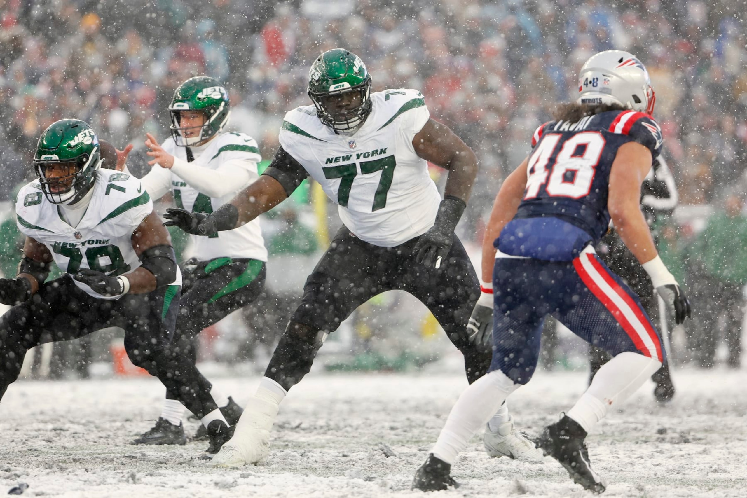 FOXBOROUGH, MA - JANUARY 7: Mekhi Becton #77 of the New York Jets looks to block against the New England Patriots at Gillette Stadium on January 7, 2024 in Foxborough, Massachusetts.(Photo By Winslow Townson/Getty Images)