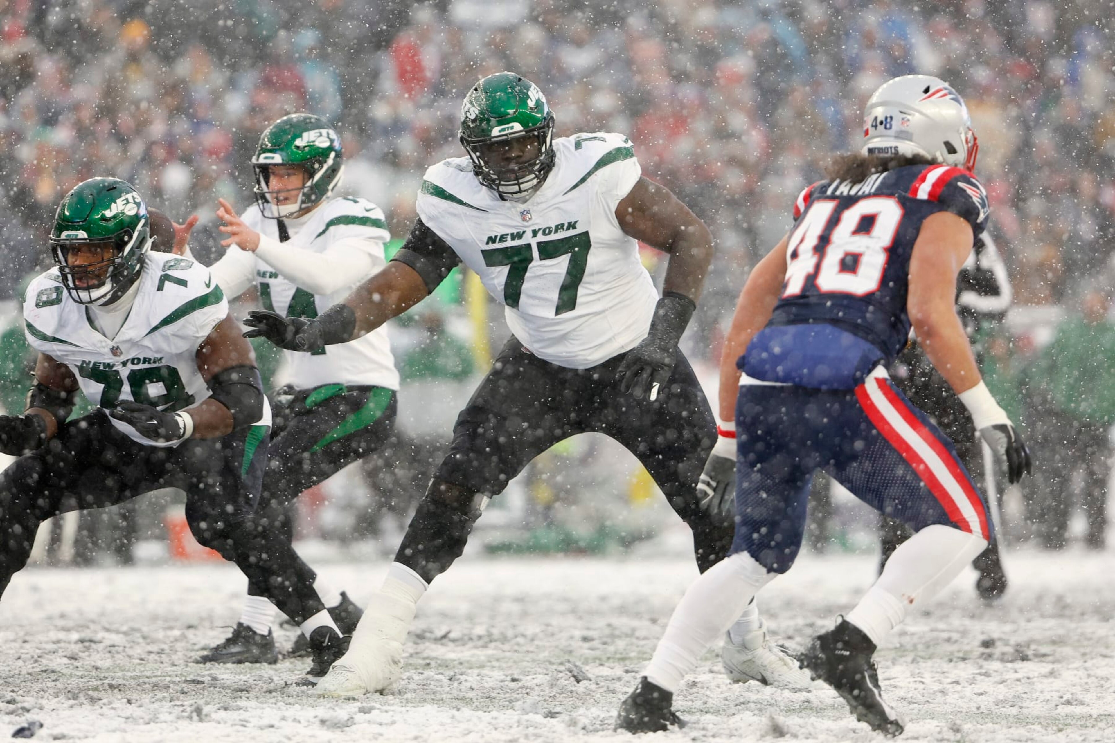 FOXBOROUGH, MA - JANUARY 7: Mekhi Becton #77 of the New York Jets looks to block against the New England Patriots at Gillette Stadium on January 7, 2024 in Foxborough, Massachusetts.(Photo By Winslow Townson/Getty Images)