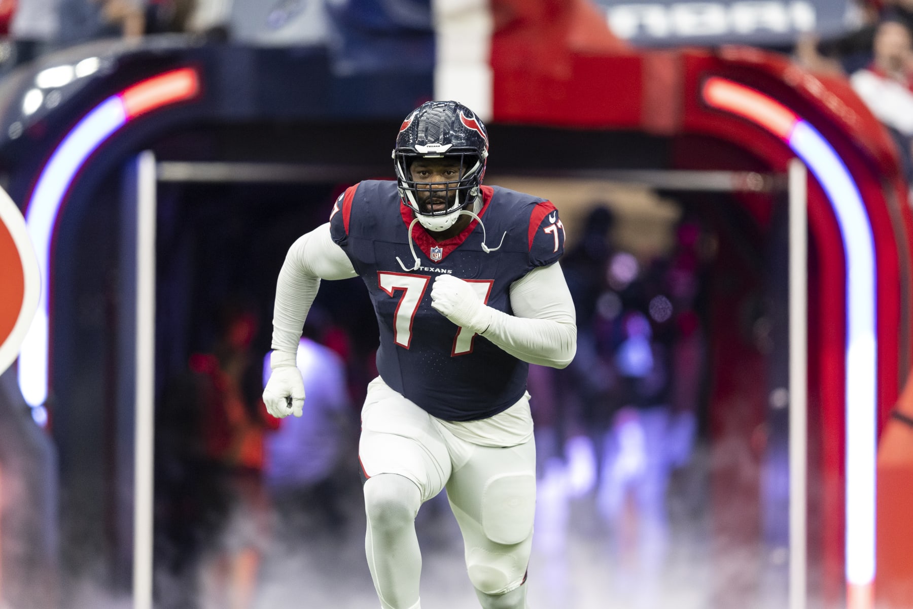 HOUSTON, TEXAS - JANUARY 13: George Fant #77 of the Houston Texans takes the field prior to an NFL wild-card playoff football game between the Houston Texans and the Cleveland Browns at NRG Stadium on January 13, 2024 in Houston, Texas. (Photo by Michael Owens/Getty Images)