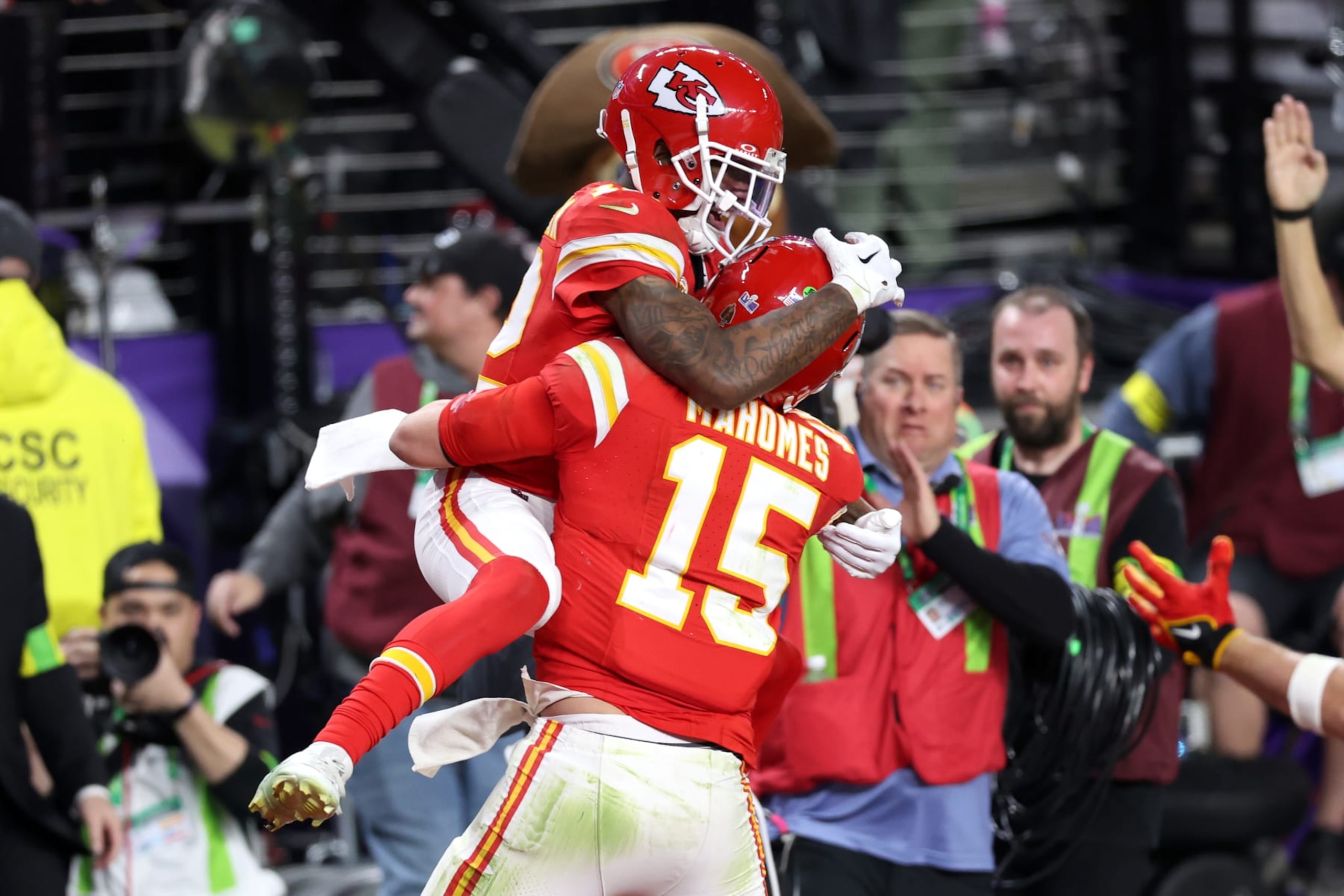 LAS VEGAS, NEVADA - FEBRUARY 11: Mecole Hardman Jr. #12 of the Kansas City Chiefs celebrates with Patrick Mahomes #15 after scoring the game-winning touchdown in overtime to defeat the San Francisco 49ers 25-22 during Super Bowl LVIII at Allegiant Stadium on February 11, 2024 in Las Vegas, Nevada. (Photo by Steph Chambers/Getty Images)
