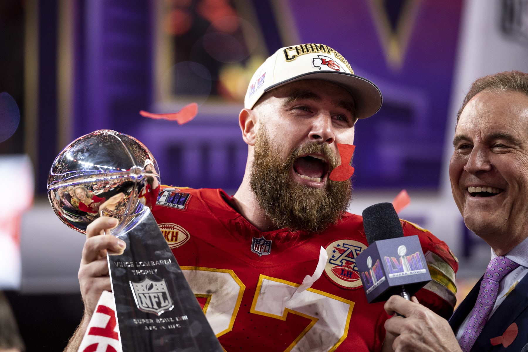 LAS VEGAS, NEVADA - FEBRUARY 11: Travis Kelce #87 of the Kansas City Chiefs celebrates with the Vince Lombardi Trophy following the NFL Super Bowl 58 football game between the San Francisco 49ers and the Kansas City Chiefs at Allegiant Stadium on February 11, 2024 in Las Vegas, Nevada. (Photo by Michael Owens/Getty Images)