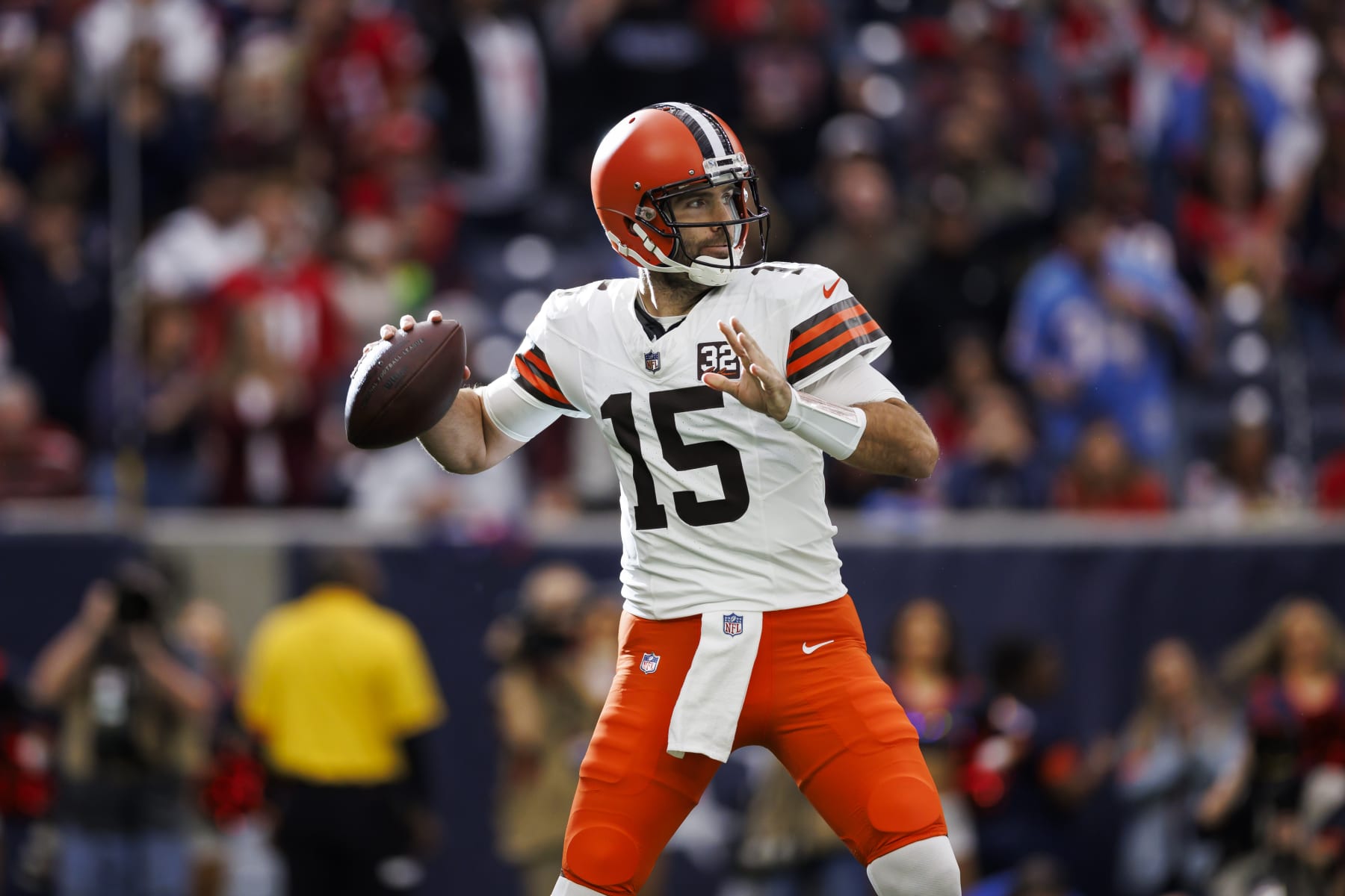 HOUSTON, TEXAS - JANUARY 13: Joe Flacco #15 of the Cleveland Browns drops back and looks to throw a pass during an AFC wild-card playoff football game against the Houston Texans at NRG Stadium on January 13, 2024 in Houston, Texas. (Photo by Ryan Kang/Getty Images)
