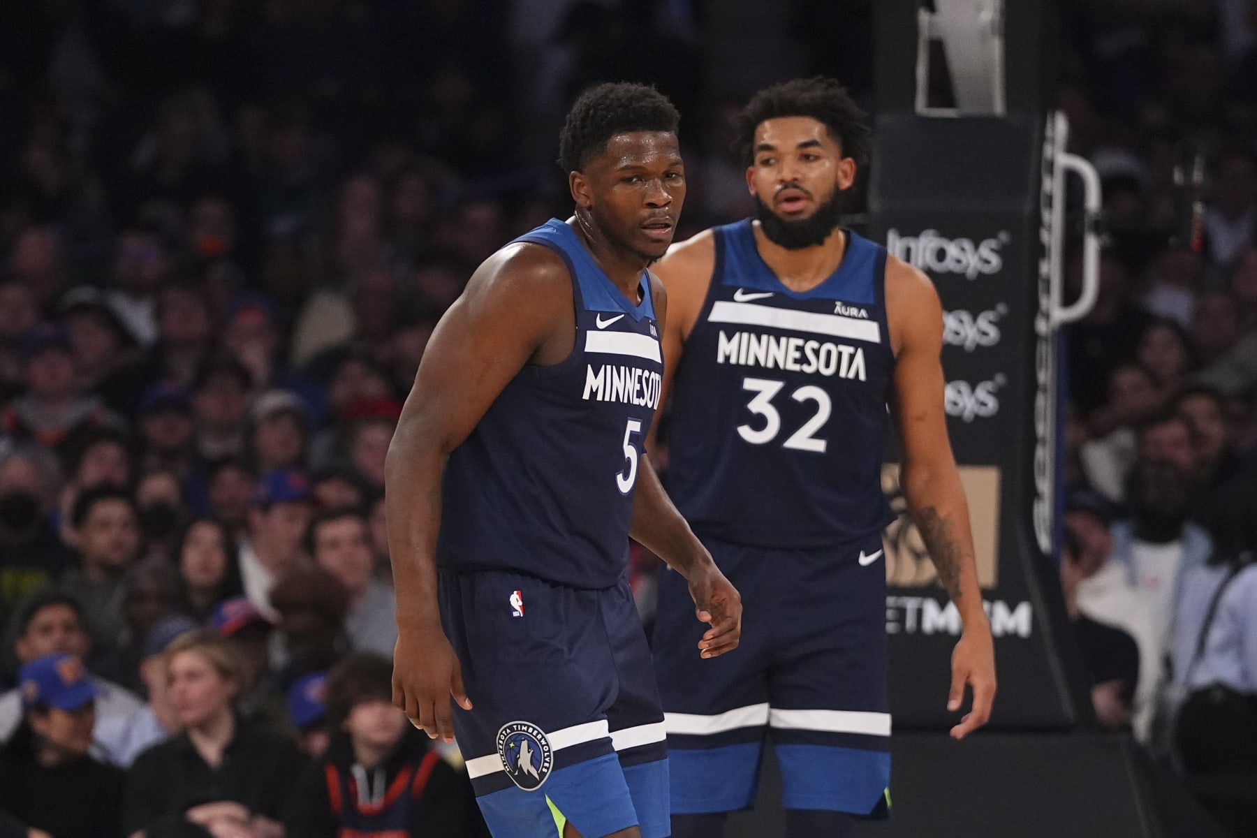 NEW YORK, NEW YORK - JANUARY 1: Anthony Edwards #5 and Karl-Anthony Towns #32 of the Minnesota Timberwolves look on against the New York Knicks at Madison Square Garden on January 1, 2024 in New York City. The Knicks defeated the Timberwolves 112-106. NOTE TO USER: User expressly acknowledges and agrees that, by downloading and or using this photograph, User is consenting to the terms and conditions of the Getty Images License Agreement. (Photo by Mitchell Leff/Getty Images)