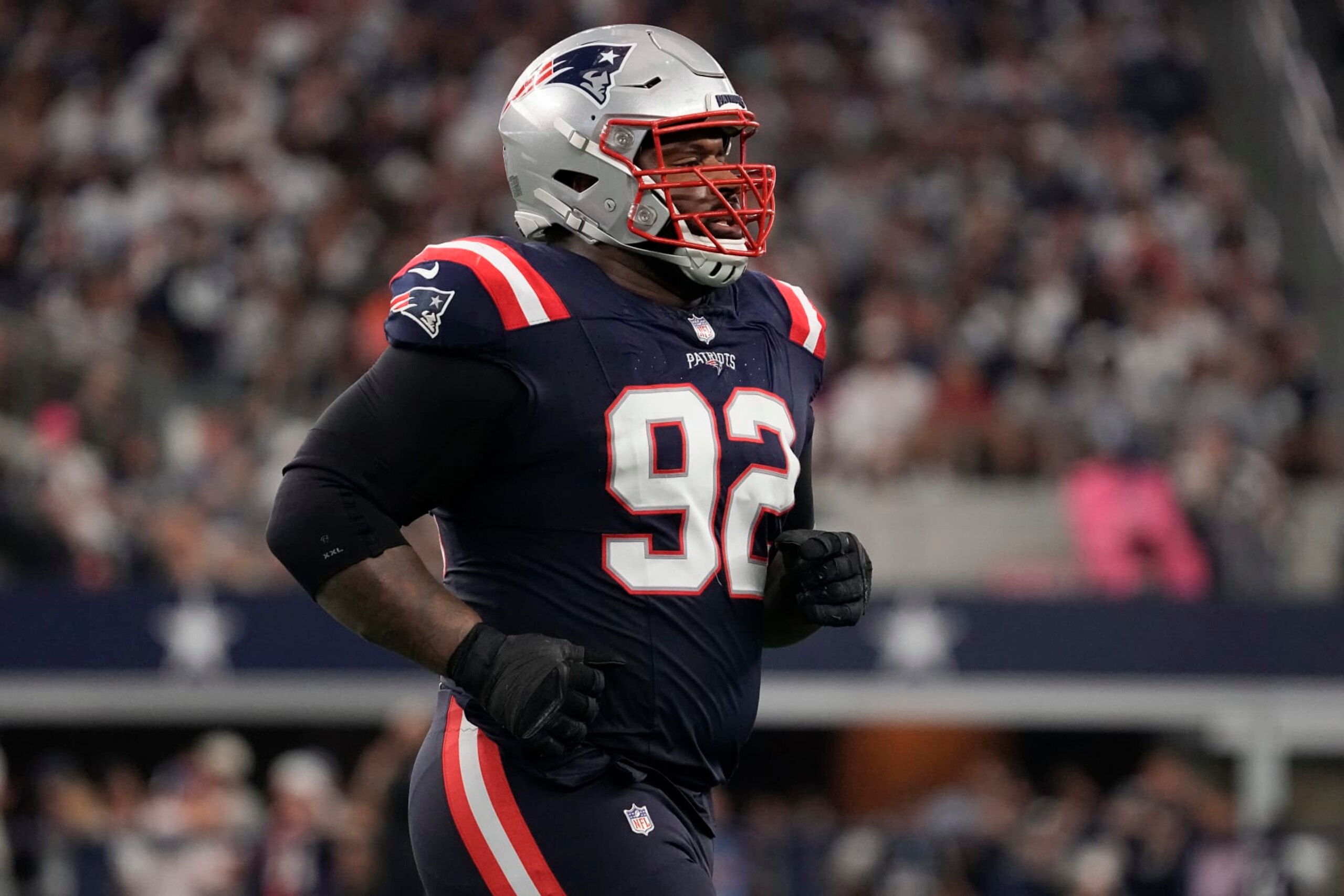 ARLINGTON, TEXAS - OCTOBER 01: Davon Godchaux #92 of the New England Patriots runs off the field during the second half against the Dallas Cowboys at AT&T Stadium on October 01, 2023 in Arlington, Texas. (Photo by Sam Hodde/Getty Images) ARLINGTON, TEXAS - OCTOBER 01: Davon Godchaux #92 of the New England Patriots runs off the field during the second half against the Dallas Cowboys at AT&T Stadium on October 01, 2023 in Arlington, Texas. (Photo by Sam Hodde/Getty Images)