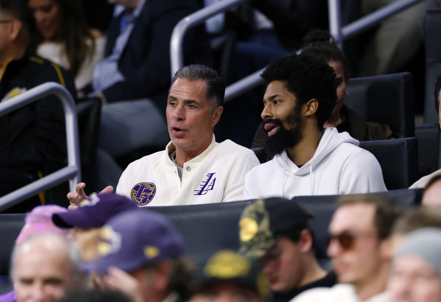 LOS ANGELES, CALIFORNIA - FEBRUARY 09: Rob Pelinka (L), vice president of basketball operations and general manager of the Los Angeles Lakers, and free agent Spencer Dinwiddie, formerly of the Brooklyn Nets, attend the New Orleans Pelicans and Los Angeles Lakers  game at Crypto.com Arena on February 9, 2024 in Los Angeles, California. NOTE TO USER: User expressly acknowledges and agrees that, by downloading and or using this photograph, User is consenting to the terms and conditions of the Getty Images License Agreement. (Photo by Kevork Djansezian/Getty Images)