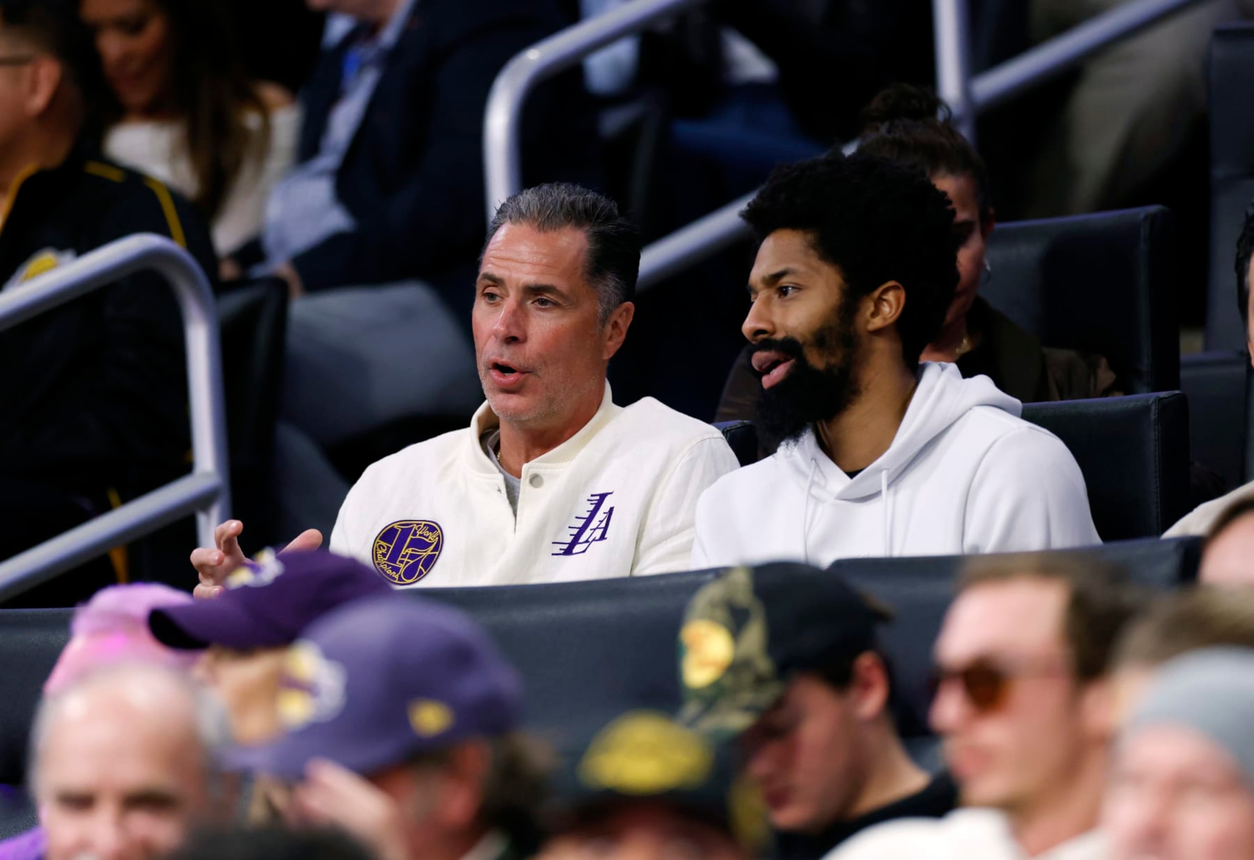 LOS ANGELES, CALIFORNIA - FEBRUARY 09: Rob Pelinka (L), vice president of basketball operations and general manager of the Los Angeles Lakers, and free agent Spencer Dinwiddie, formerly of the Brooklyn Nets, attend the New Orleans Pelicans and Los Angeles Lakers  game at Crypto.com Arena on February 9, 2024 in Los Angeles, California. NOTE TO USER: User expressly acknowledges and agrees that, by downloading and or using this photograph, User is consenting to the terms and conditions of the Getty Images License Agreement. (Photo by Kevork Djansezian/Getty Images)