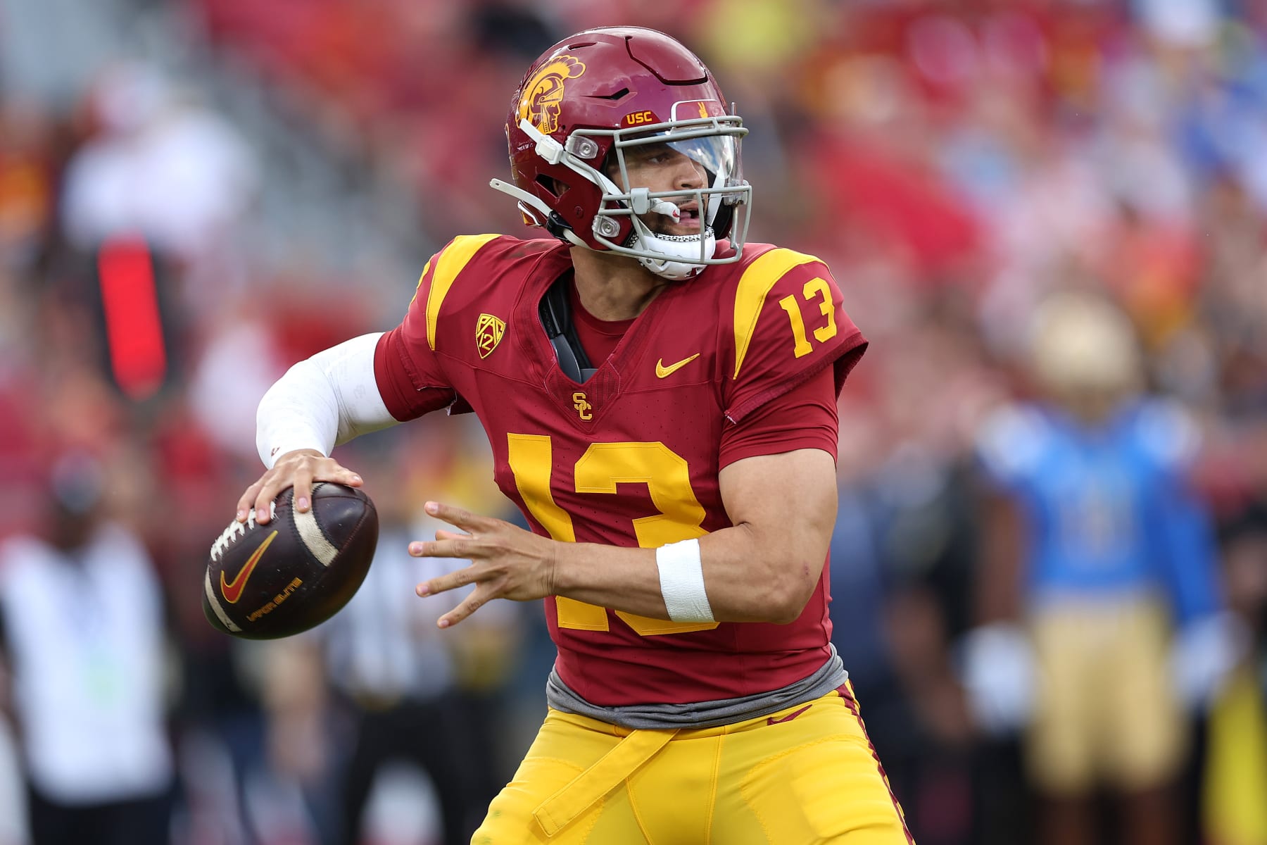 LOS ANGELES, CALIFORNIA - NOVEMBER 18: Caleb Williams #13 of the USC Trojans passes the ball during the first half of a game against the UCLA Bruins at United Airlines Field at the Los Angeles Memorial Coliseum on November 18, 2023 in Los Angeles, California. (Photo by Sean M. Haffey/Getty Images)