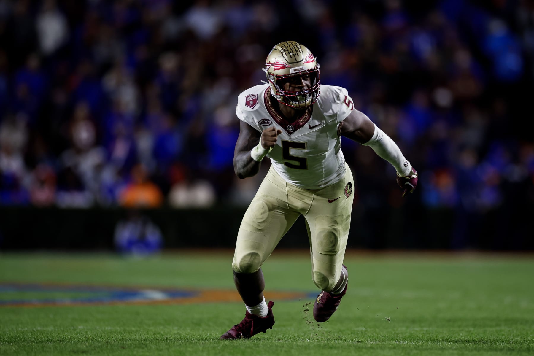 GAINESVILLE, FLORIDA - NOVEMBER 25: Jared Verse #5 of the Florida State Seminoles rushes the passer during the second half of a game against the Florida Gators at Ben Hill Griffin Stadium on November 25, 2023 in Gainesville, Florida. (Photo by James Gilbert/Getty Images)