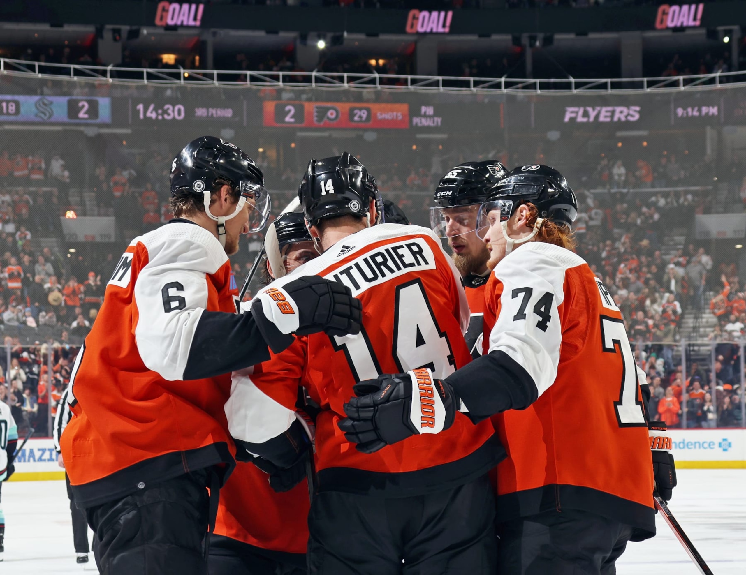 PHILADELPHIA, PENNSYLVANIA - FEBRUARY 10: Sean Couturier #14 of the Philadelphia Flyers celebrates his third period goal against the Seattle Kraken with Travis Sanheim #6, Travis Konecny #11, Rasmus Ristolainen #55, and Owen Tippett #74 at the Wells Fargo Center on February 10, 2024 in Philadelphia, Pennsylvania. (Photo by Len Redkoles/NHLI via Getty Images) PHILADELPHIA, PENNSYLVANIA - FEBRUARY 10: Sean Couturier #14 of the Philadelphia Flyers celebrates his third period goal against the Seattle Kraken with Travis Sanheim #6, Travis Konecny #11, Rasmus Ristolainen #55, and Owen Tippett #74 at the Wells Fargo Center on February 10, 2024 in Philadelphia, Pennsylvania. (Photo by Len Redkoles/NHLI via Getty Images)
