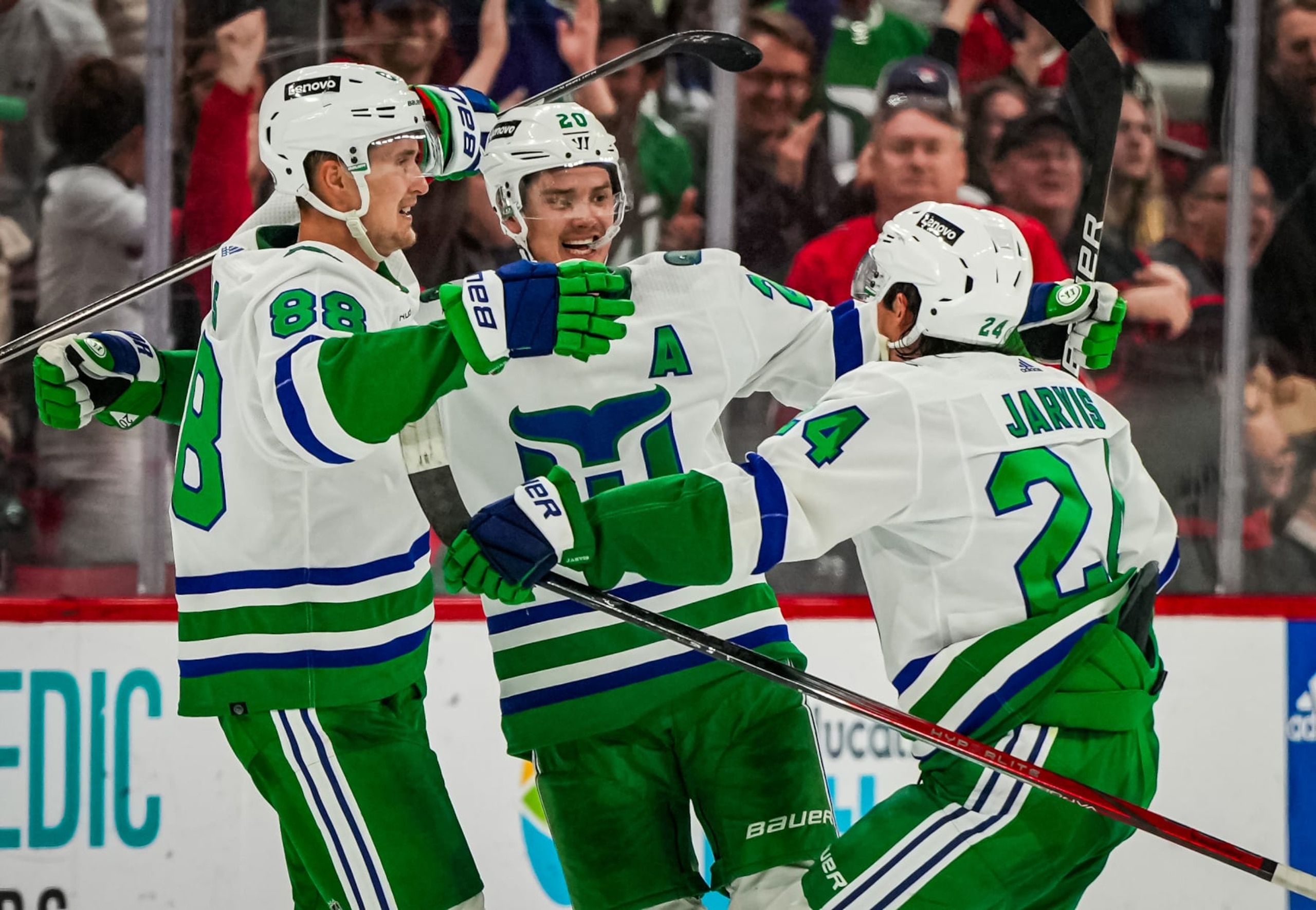 RALEIGH, NORTH CAROLINA - FEBRUARY 10: Sebastian Aho #20 of the Carolina Hurricanes celebrates after scoring the game-winning goal in overtime to defeat the New Jersey Devils at PNC Arena on February 10, 2024 in Raleigh, North Carolina. (Photo by Josh Lavallee/NHLI via Getty Images) RALEIGH, NORTH CAROLINA - FEBRUARY 10: Sebastian Aho #20 of the Carolina Hurricanes celebrates after scoring the game-winning goal in overtime to defeat the New Jersey Devils at PNC Arena on February 10, 2024 in Raleigh, North Carolina. (Photo by Josh Lavallee/NHLI via Getty Images)