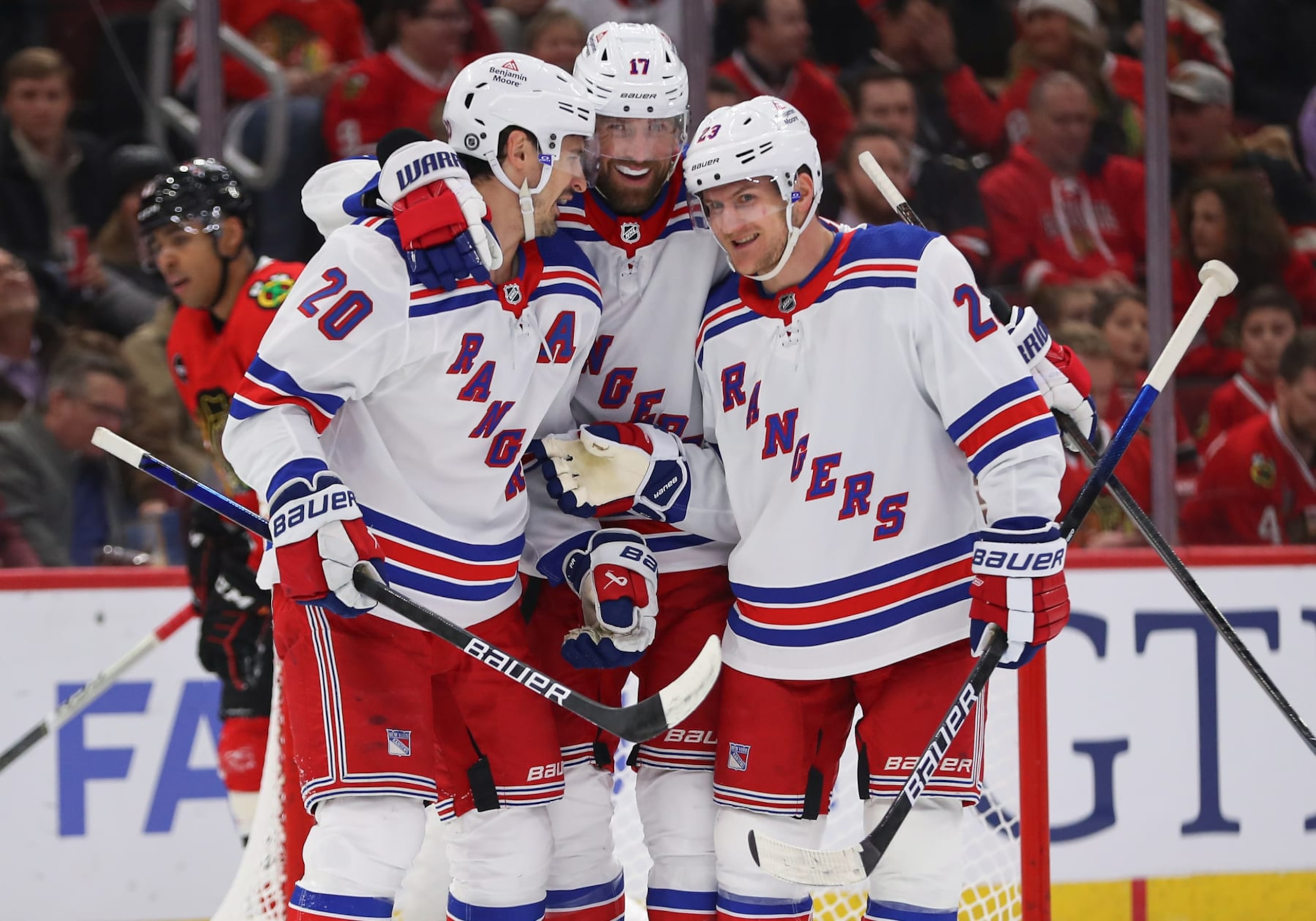 CHICAGO, IL - FEBRUARY 09: Chris Kreider #20 of the New York Rangers celebrates with teammates Chris Kreider #20 of the New York Rangers and Adam Fox #23 of the New York Rangers after scoring a goal during the first period against the Chicago Blackhawks at the United Center on February 9, 2024 in Chicago, Illinois. (Photo by Melissa Tamez/Icon Sportswire via Getty Images) CHICAGO, IL - FEBRUARY 09: Chris Kreider #20 of the New York Rangers celebrates with teammates Chris Kreider #20 of the New York Rangers and Adam Fox #23 of the New York Rangers after scoring a goal during the first period against the Chicago Blackhawks at the United Center on February 9, 2024 in Chicago, Illinois. (Photo by Melissa Tamez/Icon Sportswire via Getty Images)