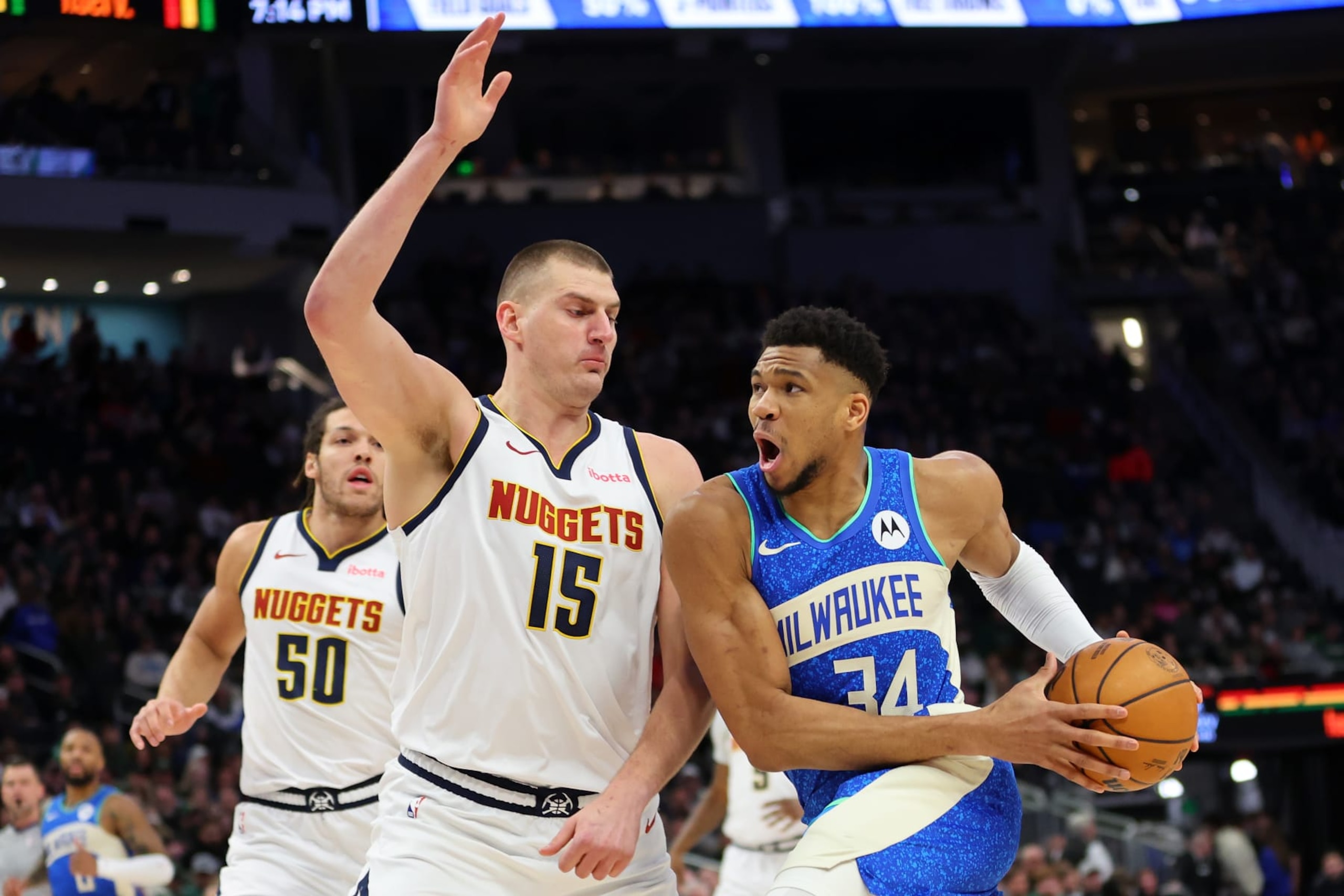 MILWAUKEE, WISCONSIN - FEBRUARY 12: Giannis Antetokounmpo #34 of the Milwaukee Bucks drives to the basket against Nikola Jokic #15 of the Denver Nuggets during the first half of a game at Fiserv Forum on February 12, 2024 in Milwaukee, Wisconsin. NOTE TO USER: User expressly acknowledges and agrees that, by downloading and or using this photograph, User is consenting to the terms and conditions of the Getty Images License Agreement. (Photo by Stacy Revere/Getty Images)