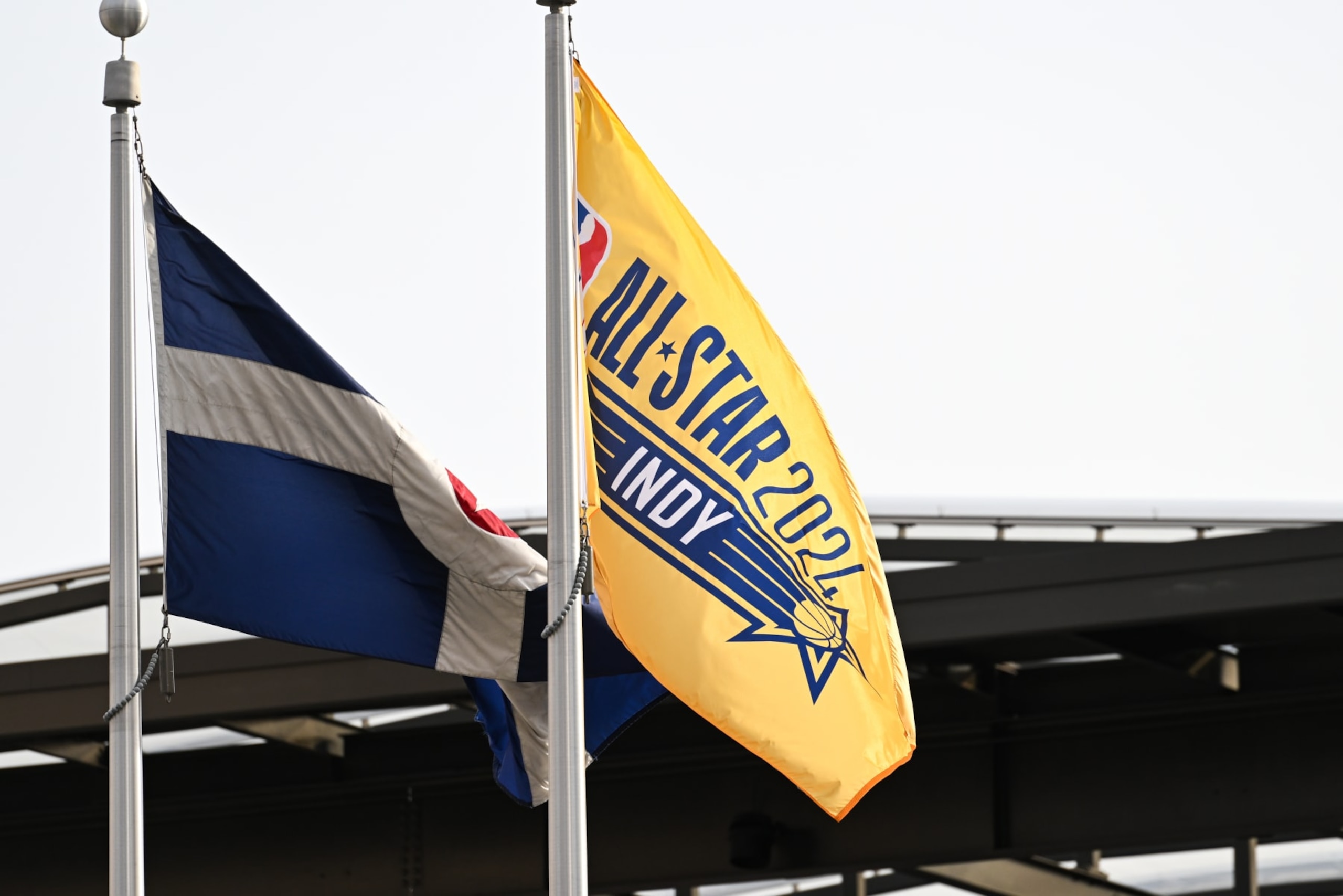 INDIANAPOLIS, IN - FEBRUARY 10: A 2024 NBA All-Star game flag waves outside of Gainbridge Fieldhouse prior to the 2024 NBA All-Star game at Gainbridge Fieldhouse on February 10, 2024 in Indianapolis, IN. (Photo by James Black/Icon Sportswire via Getty Images)