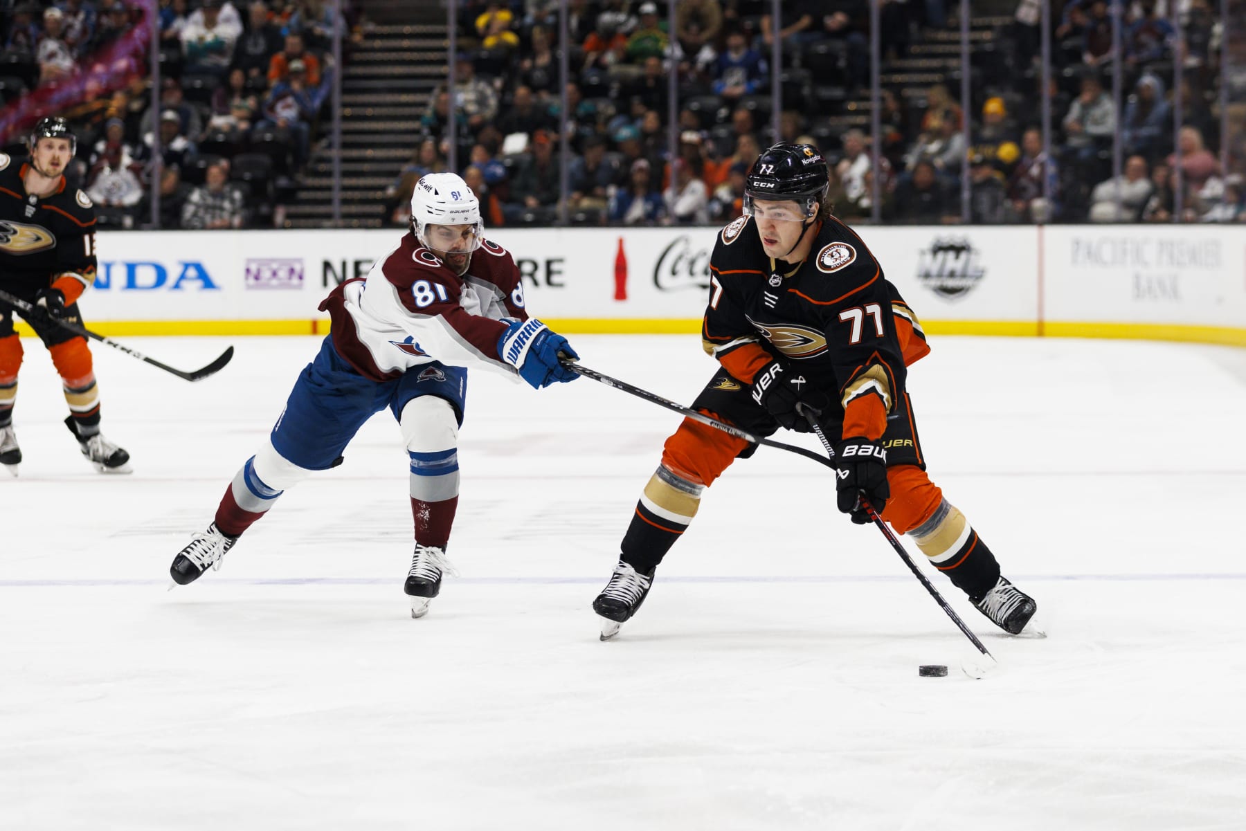 ANAHEIM, CA - MARCH 27: Colorado Avalanche center Denis Malgin (81) and Anaheim Ducks right wing Frank Vatrano (77) during an NHL hockey game on March 27, 2023 at the Honda Center in Anaheim, CA. (Photo by Ric Tapia/Icon Sportswire via Getty Images)