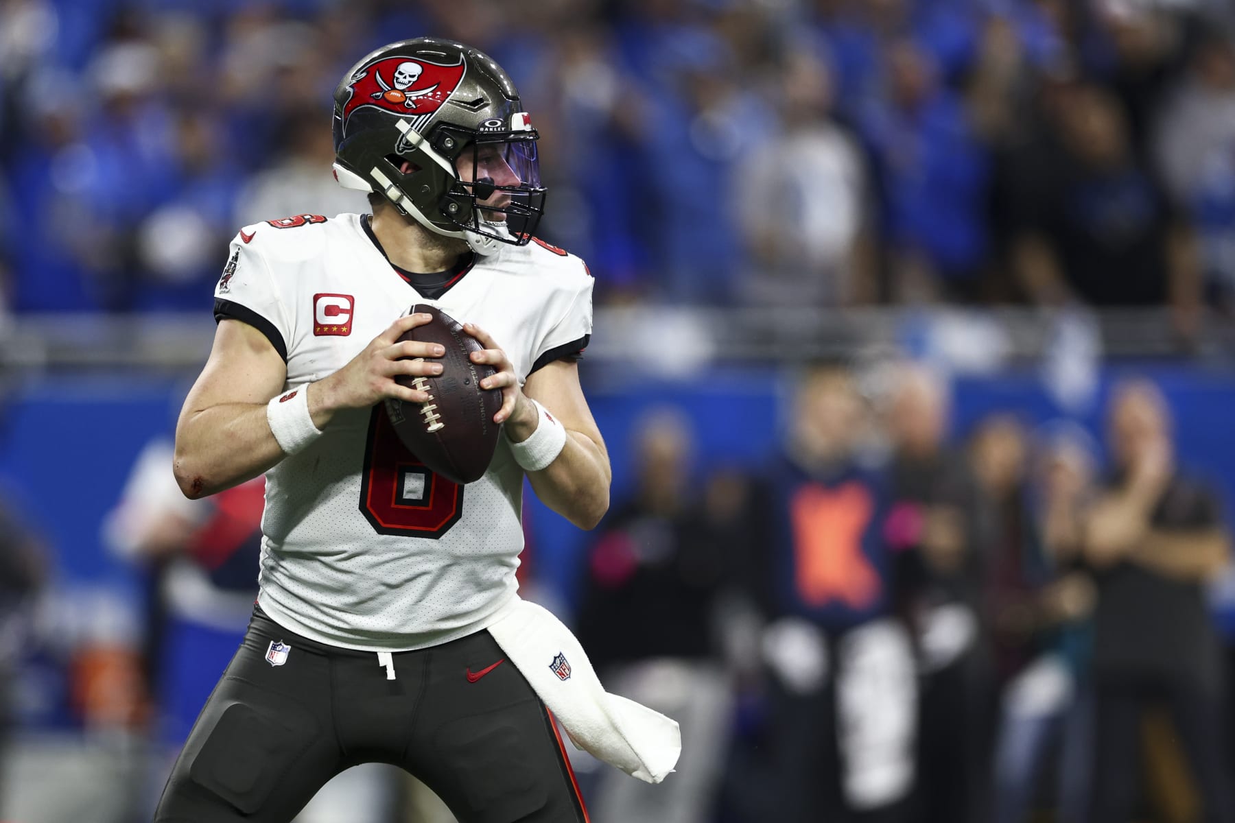 DETROIT, MI - JANUARY 21: Baker Mayfield #6 of the Tampa Bay Buccaneers drops back to pass during the fourth quarter of an NFL divisional round playoff football game against the Detroit Lions at Ford Field on January 21, 2024 in Detroit, Michigan. (Photo by Kevin Sabitus/Getty Images)
